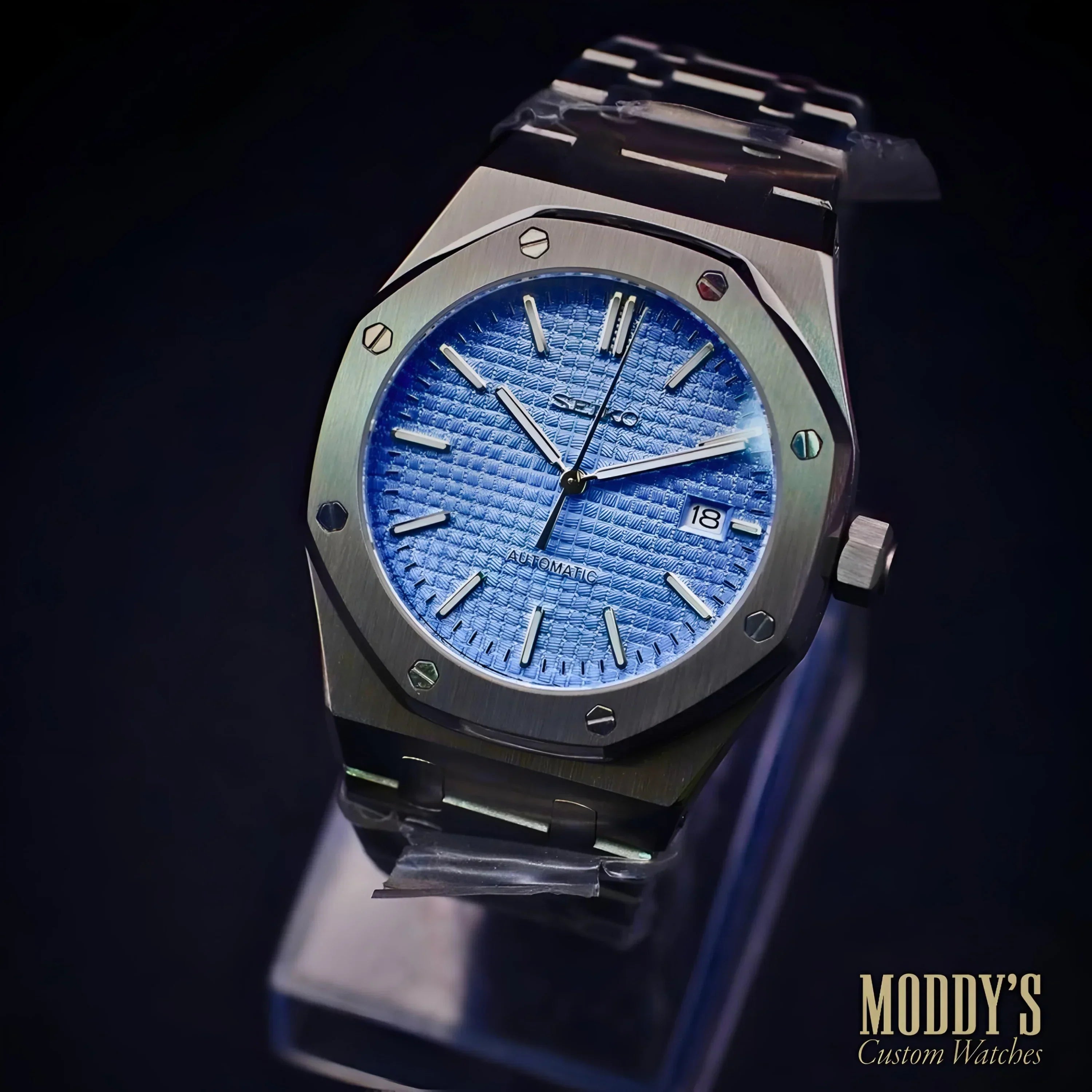 Seiko mod royal oak watch with silver steel bracelet and blue dial