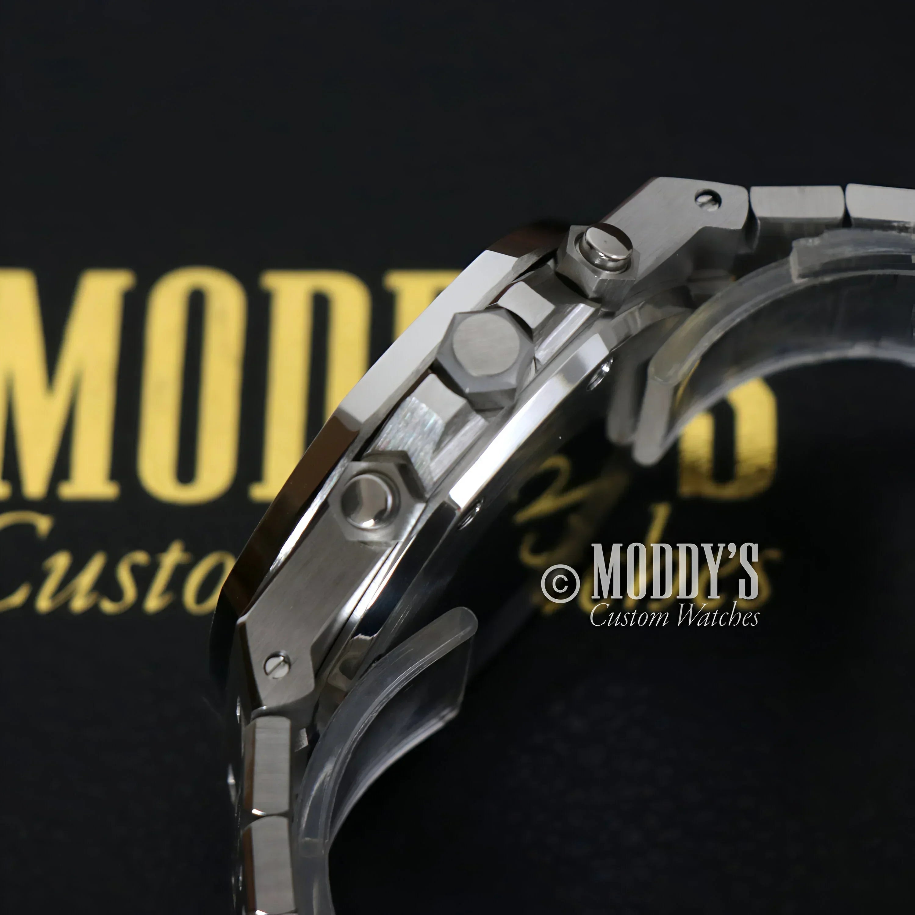 Silver chronograph wristwatch from Royal Seikoak featuring VK63 hybrid movement