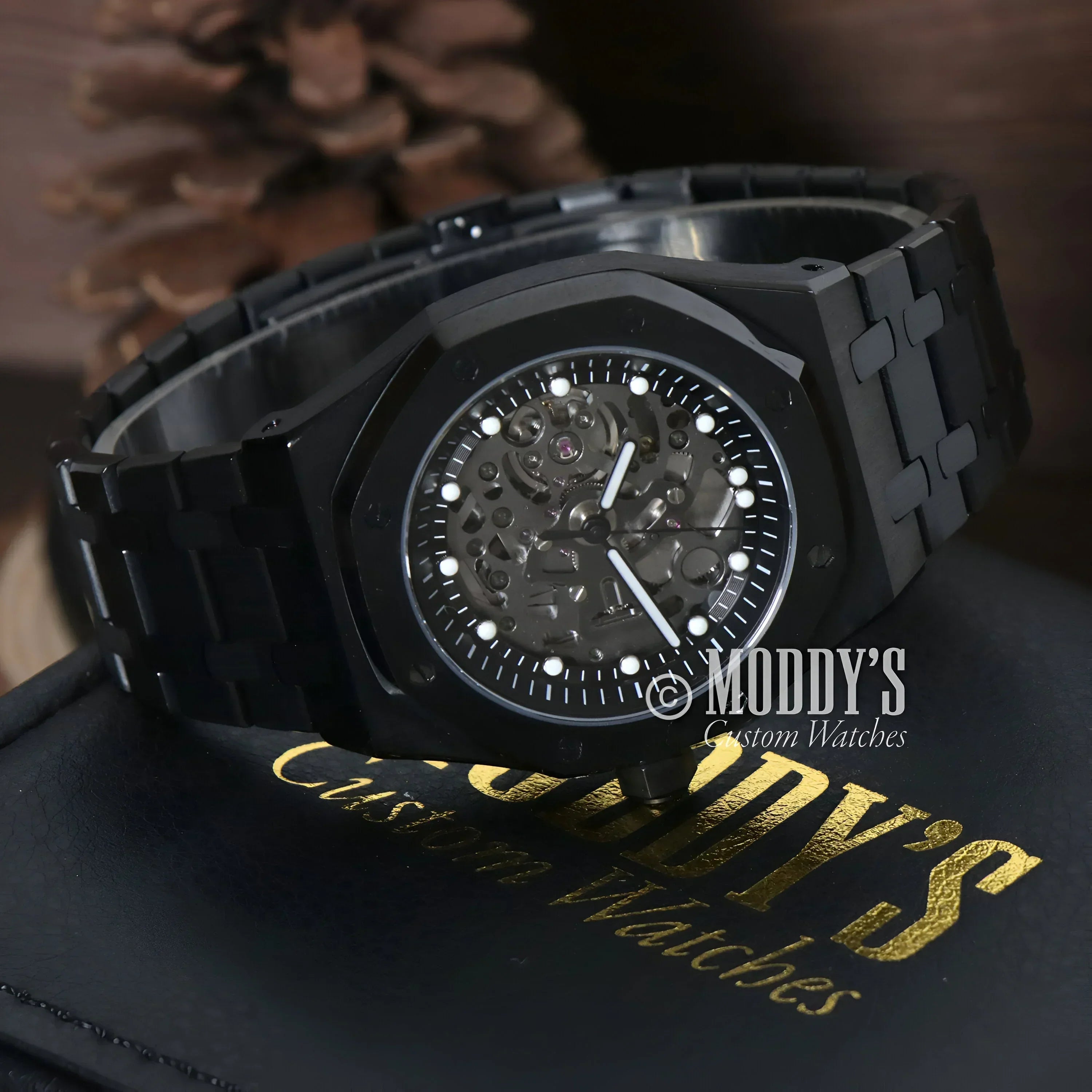 Black skeletonized wristwatch Royal Seikoak with Seiko NH72 automatic movement