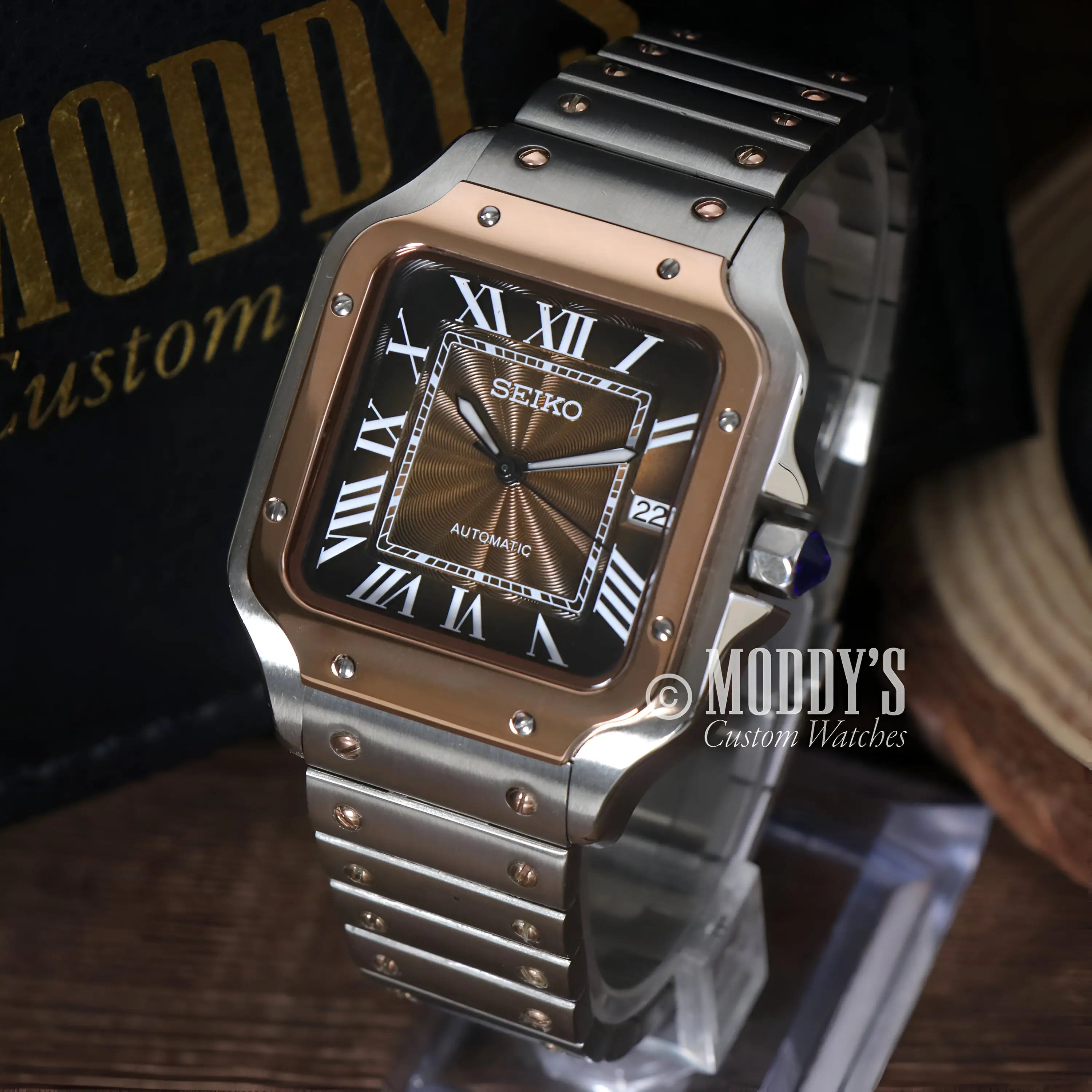 Seiko NH35 automatic mod Santos watch with black dial, gold accents, silver case, sapphire glass