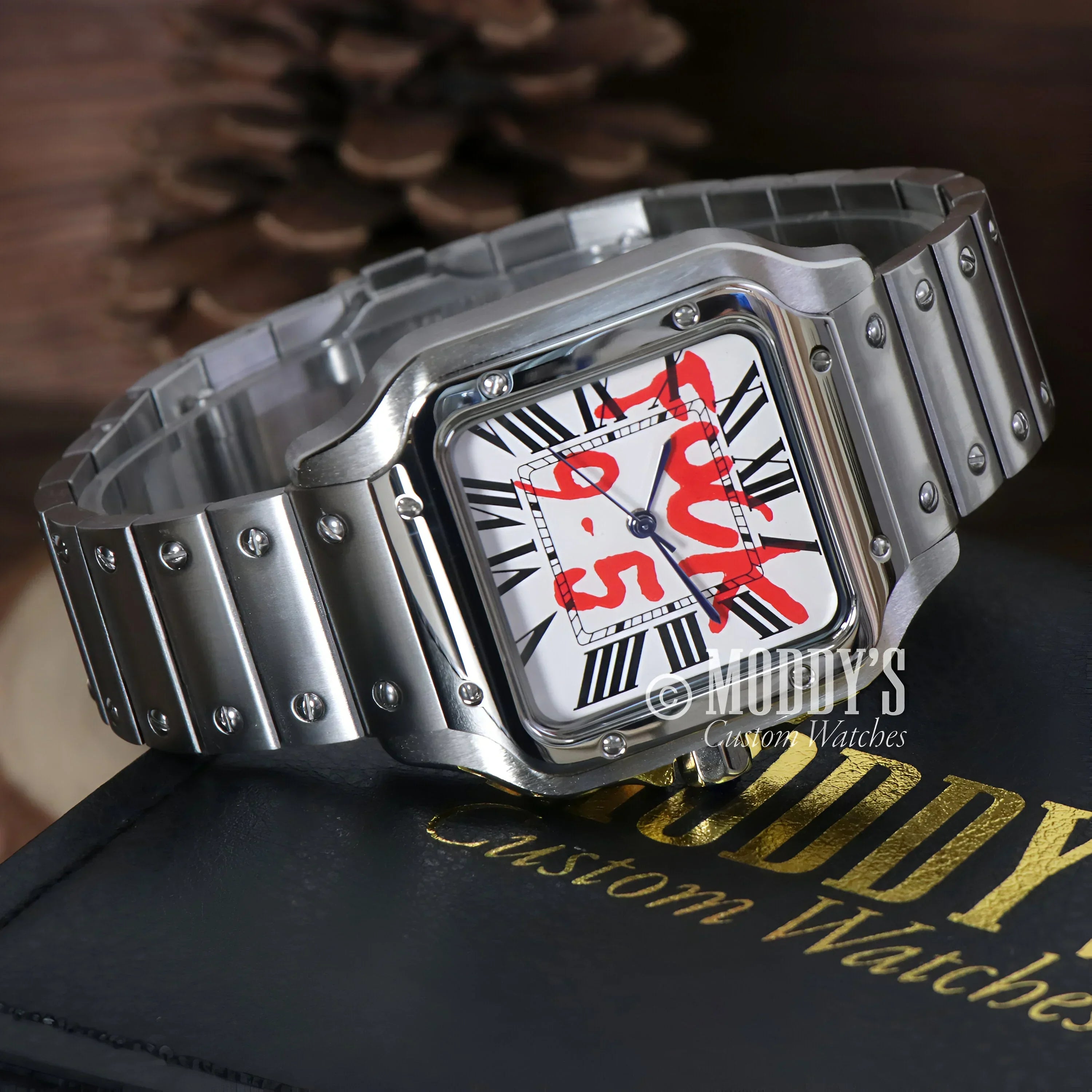 Silver Seiko mod wristwatch with red graffiti, featuring Seiko NH35 automatic movement