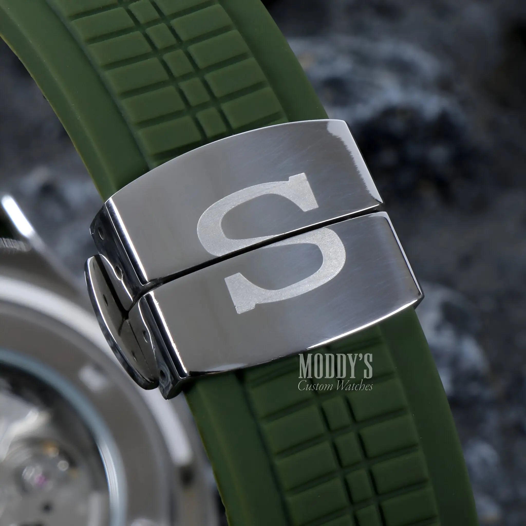 Green Seiko mod Aquanaut silicone watch band with silver buckle and S monogram
