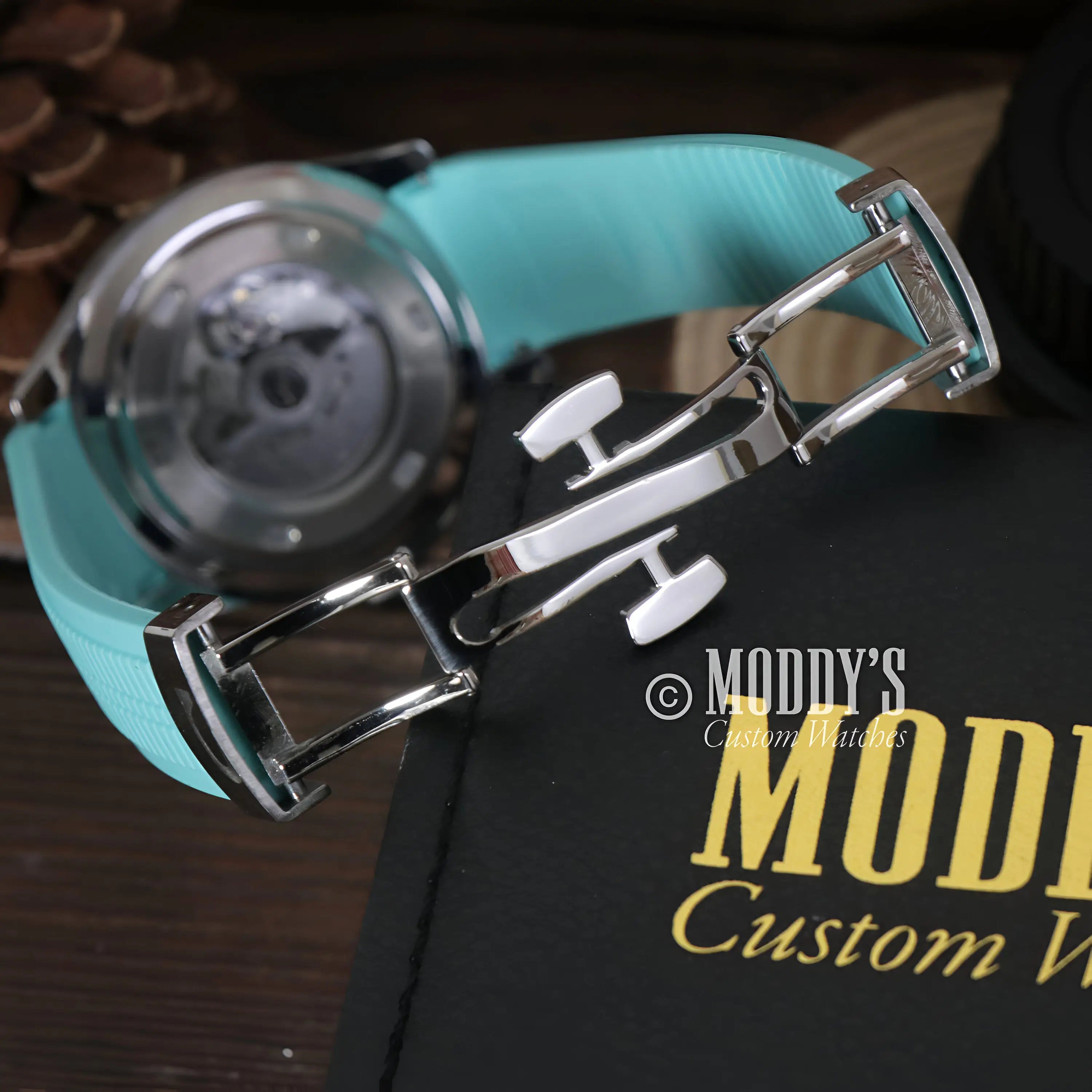 Tiffany metallic blue Seiko mod Aquanaut watch with silver buckle