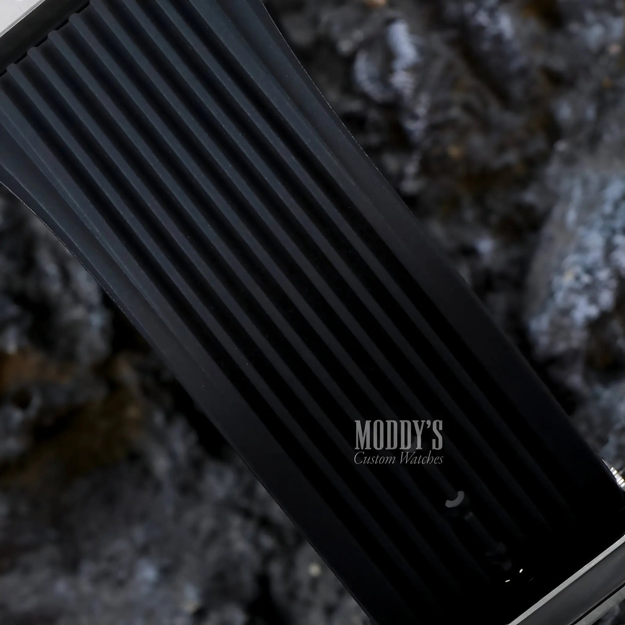 Black ridged watch band with Hubleiko Big Bang Skeleton logo