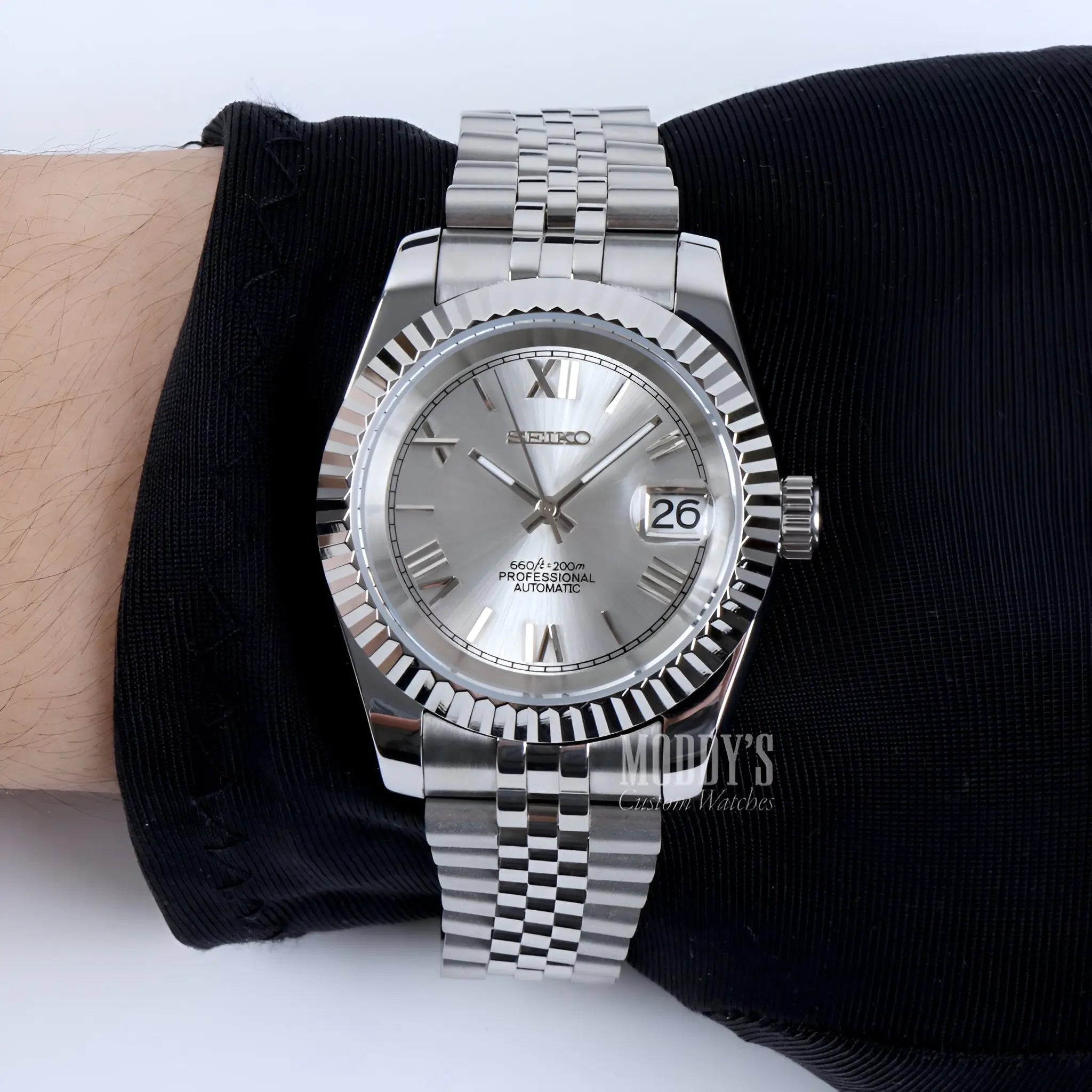 Seiko mod Datejust with silver dial, Roman numerals, date window