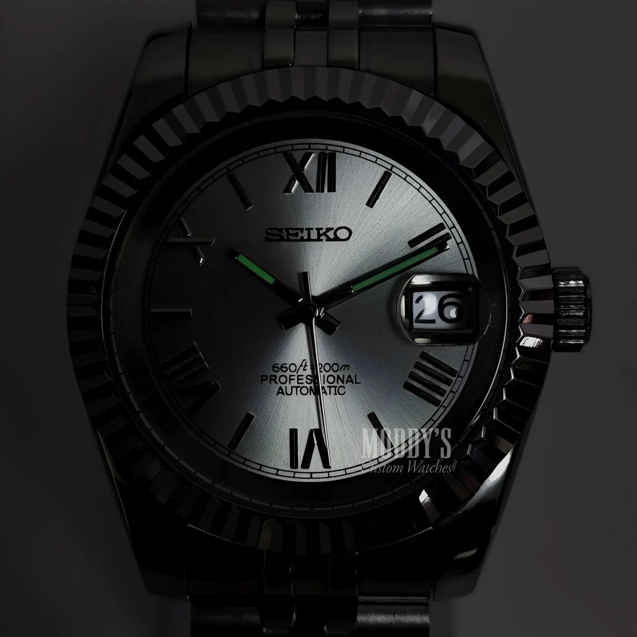 Seiko NH35 automatic mod Datejust with silver dial and green accents