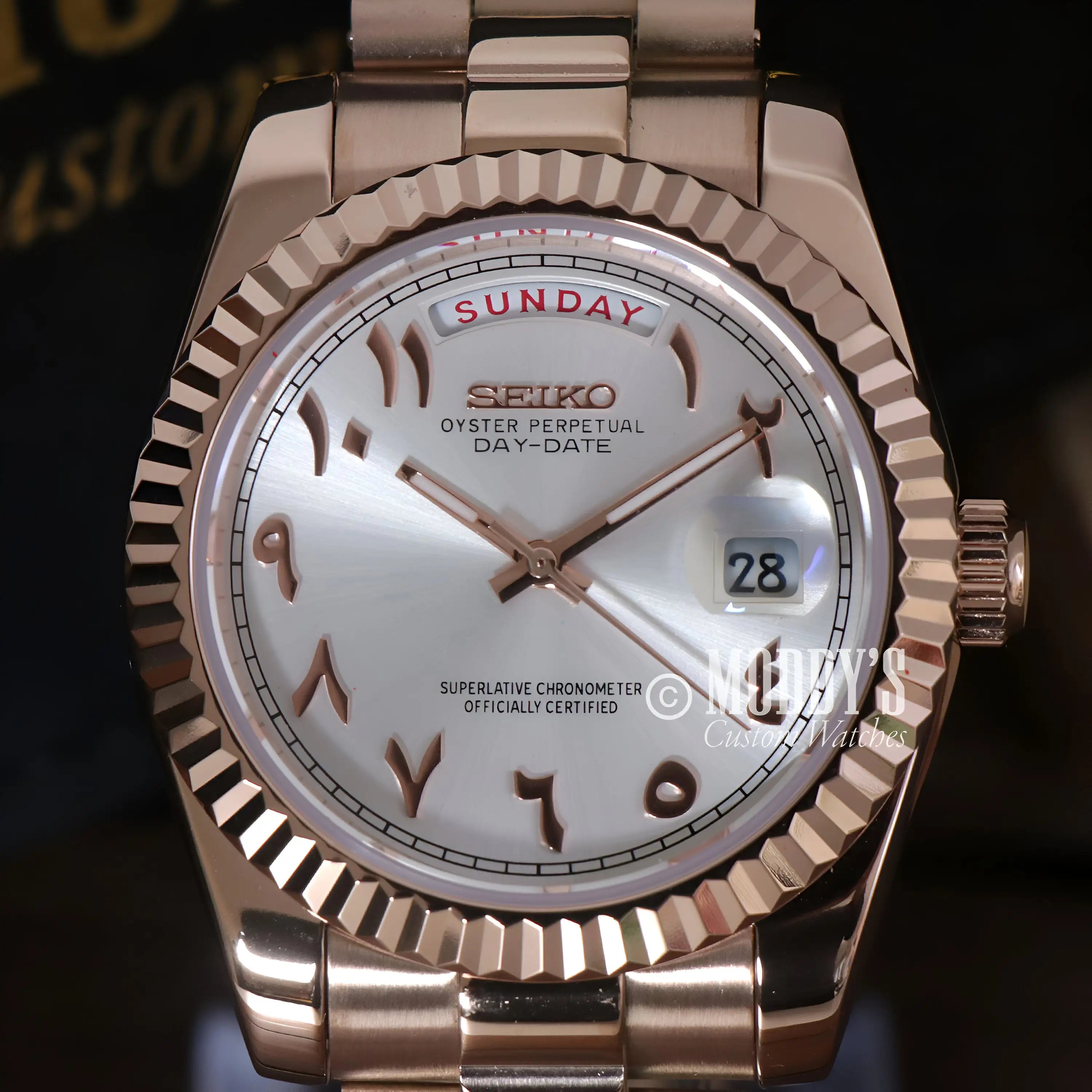 Rose gold Seiko mod day-date watch with mother-of-pearl dial and Arabic numerals