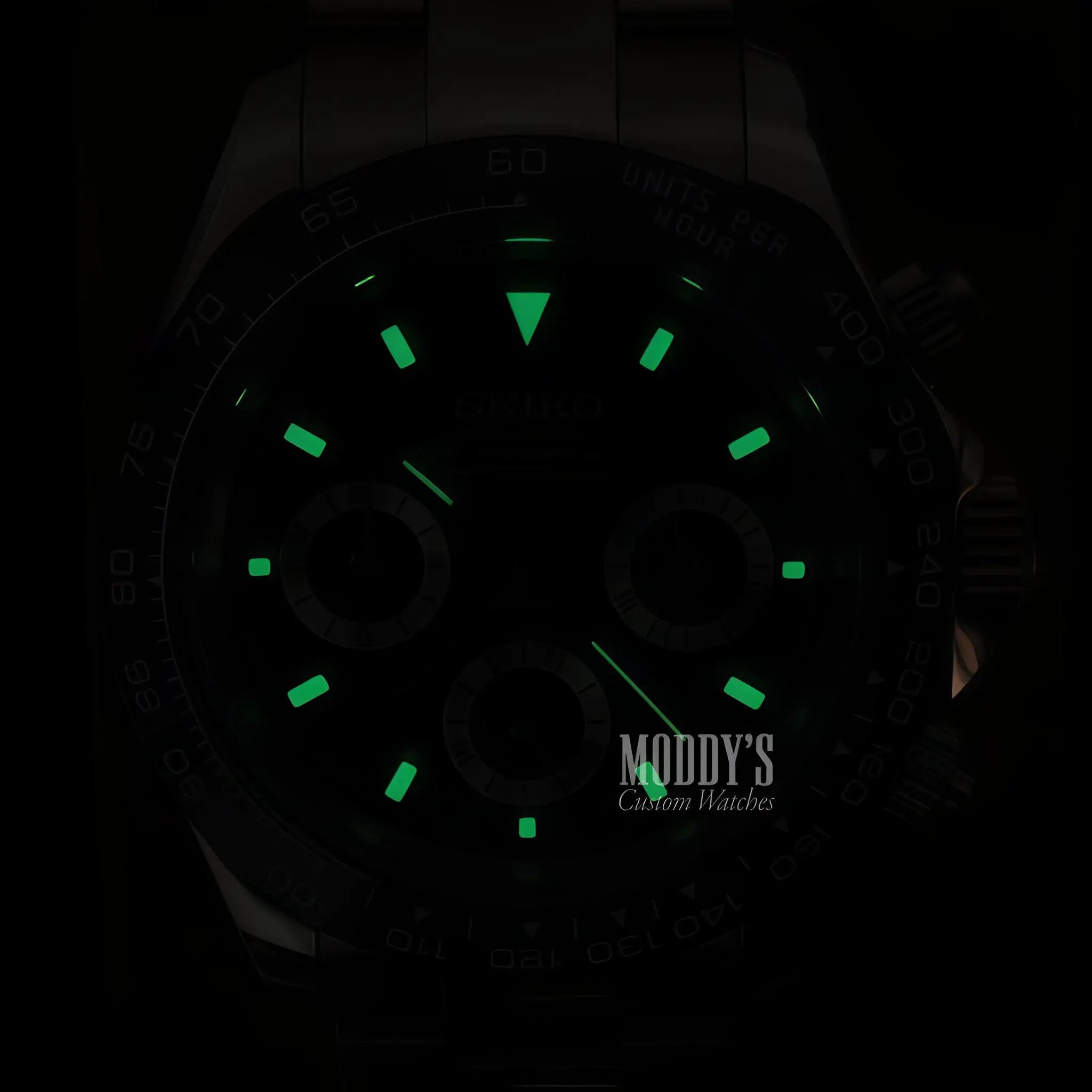 Seiko VK63 hybrid luminous green watch in iconic Daytona design