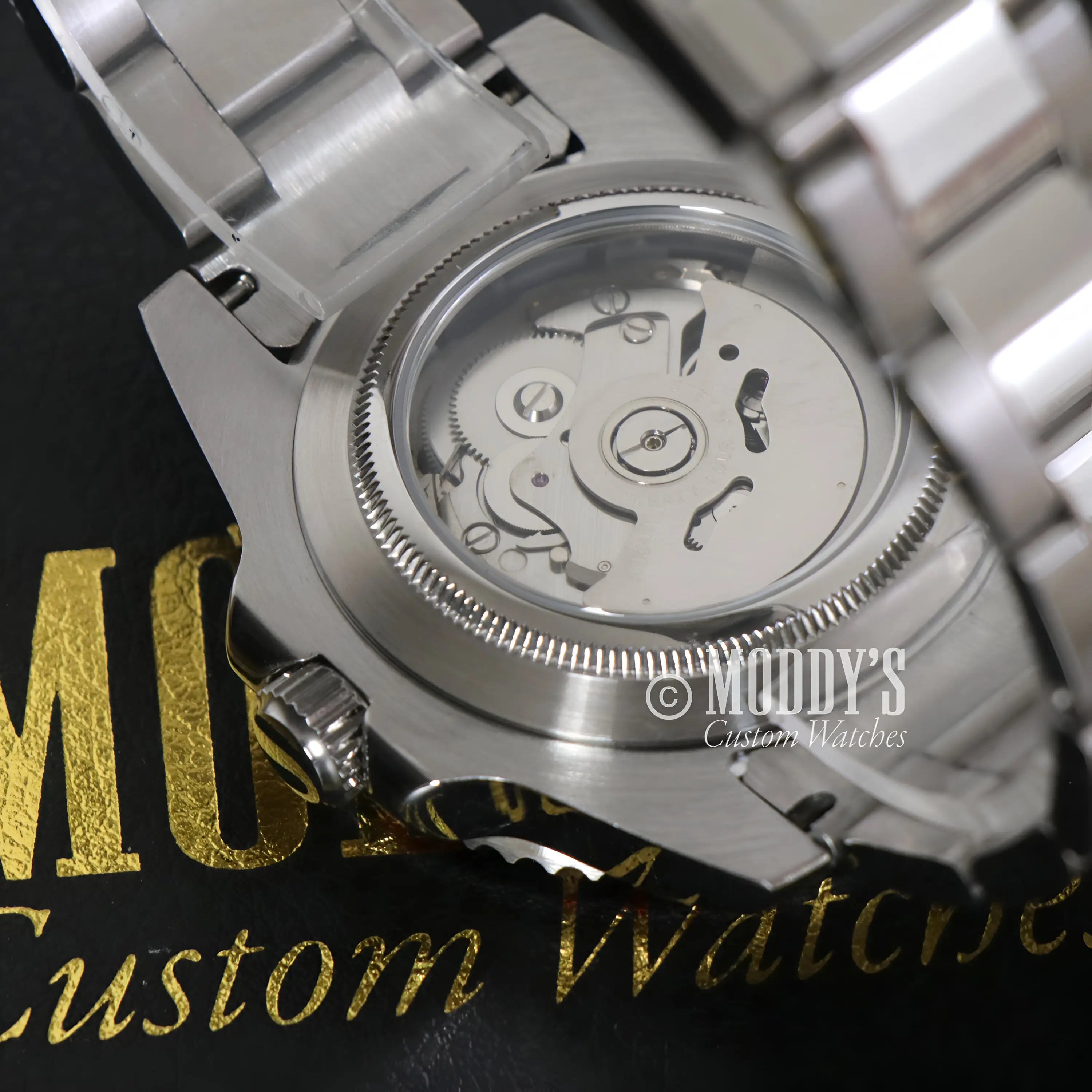 Stainless steel Seiko NH34 automatic GMT mod with transparent back