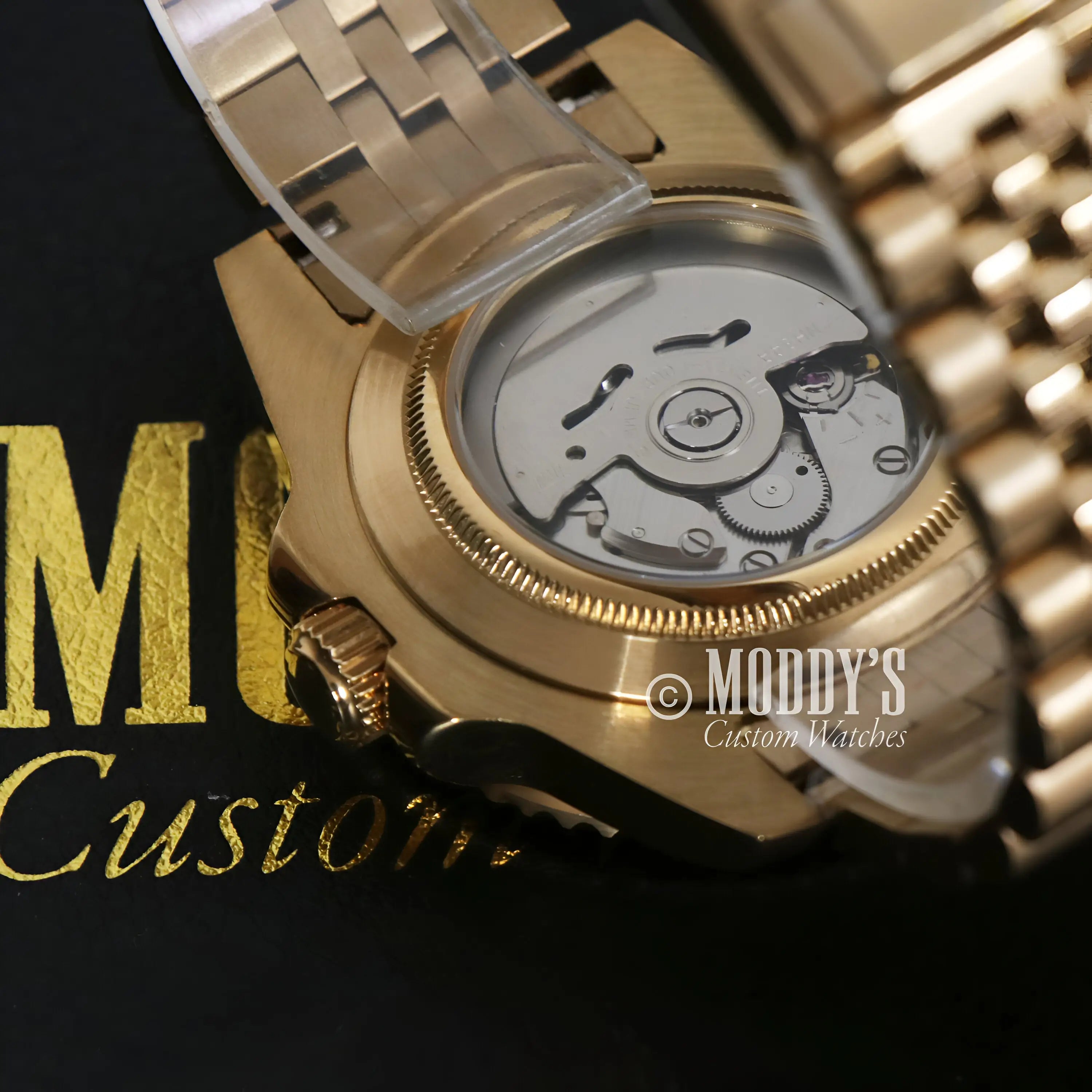 Gold Rolex watch with stainless steel band, Seiko NH34 automatic GMT mod