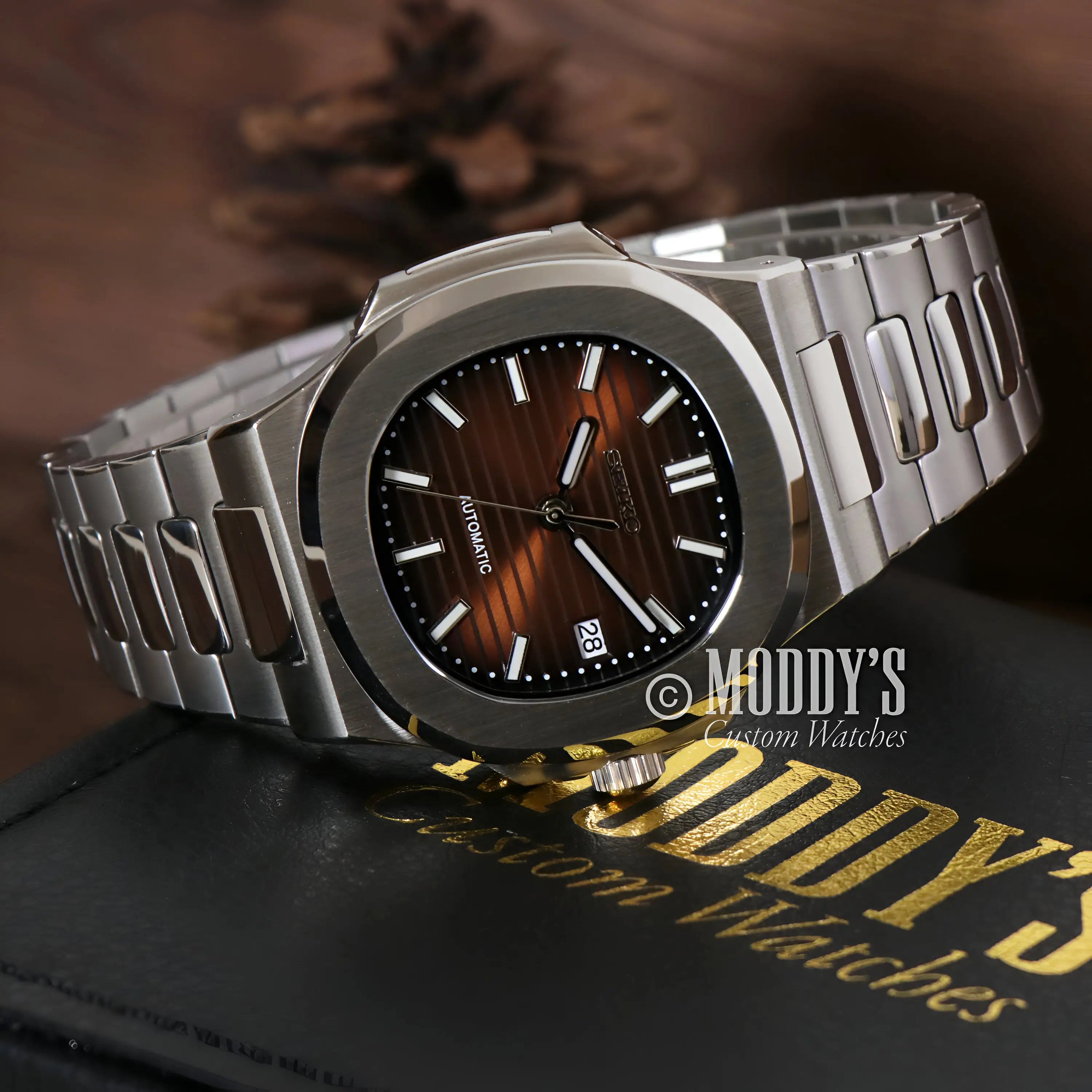 Brown and silver Seiko mod Nautilus watch with wooden dial and NH35 automatic movement