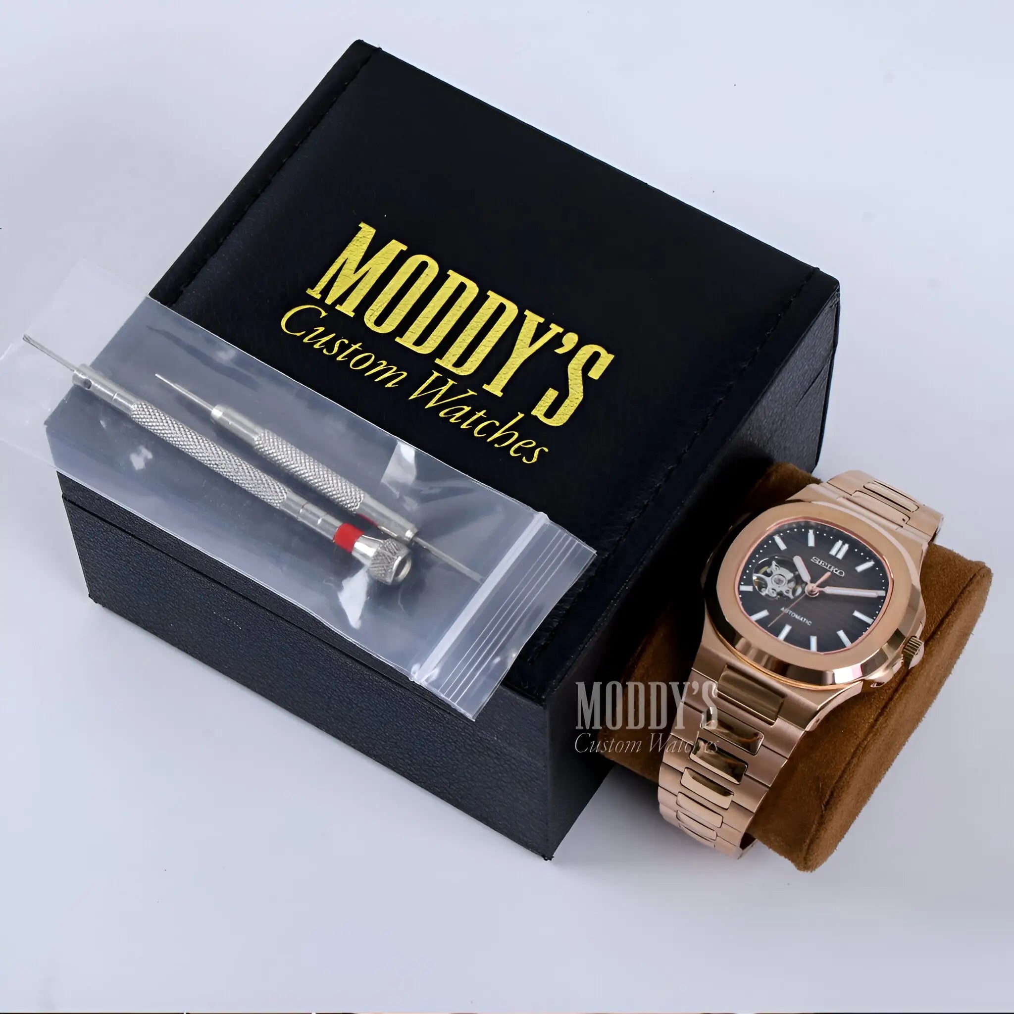 Rose Gold Patek Philippe Nautilus Watch with Black Dial