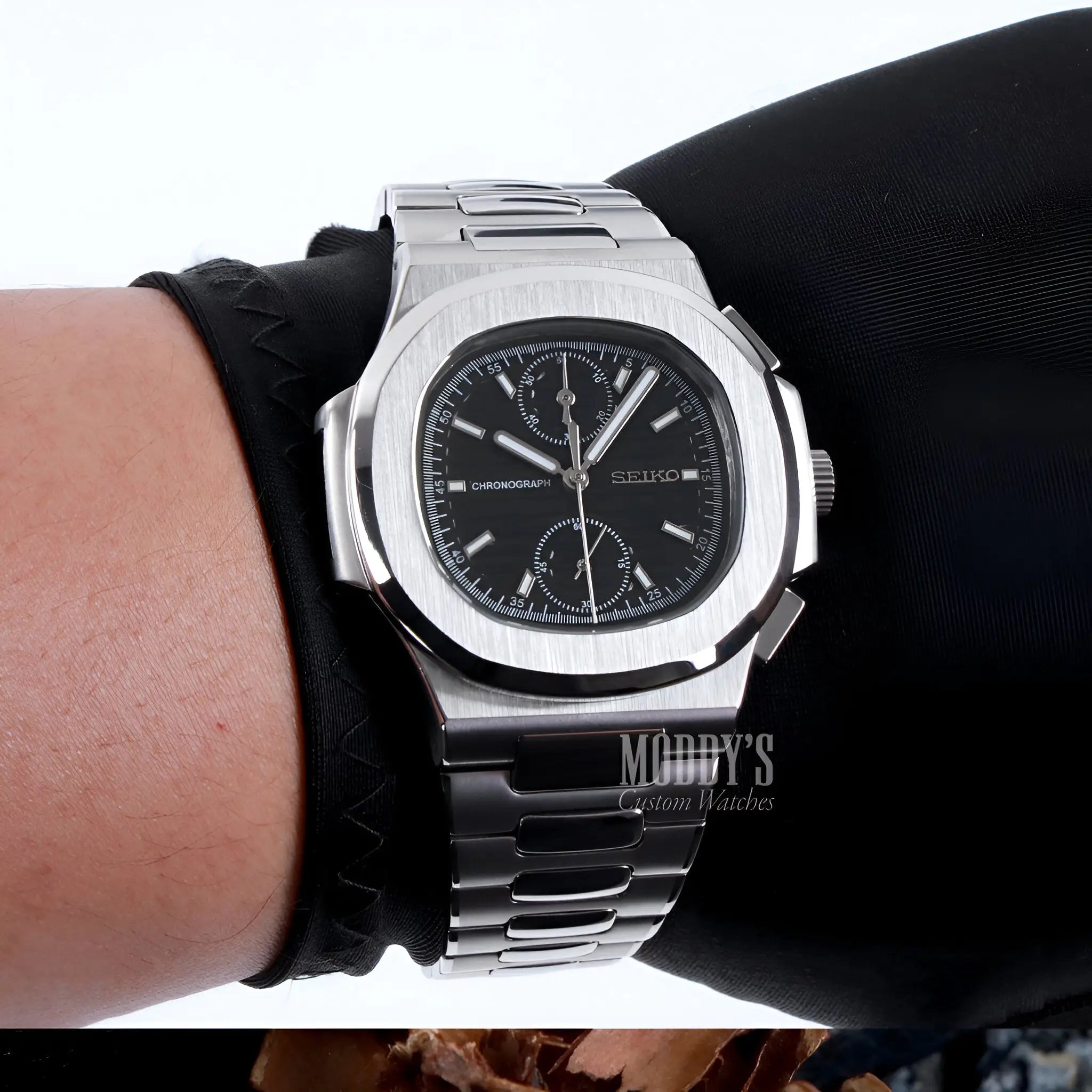 Seiko mod Nautilus chronograph with black face and 904L steel band