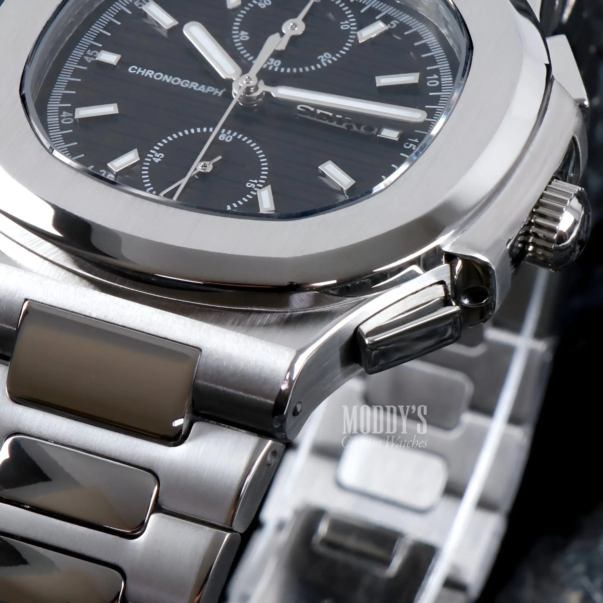 Seiko mod Nautilus chrono watch with black face and 904L steel band