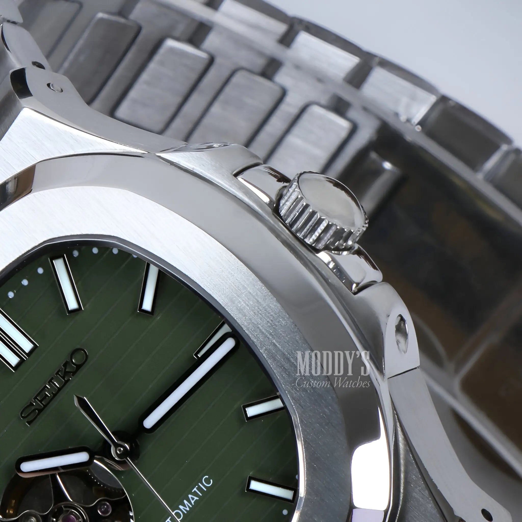 Seiko NH38 automatic movement in Nautiko Olive Green Open watch