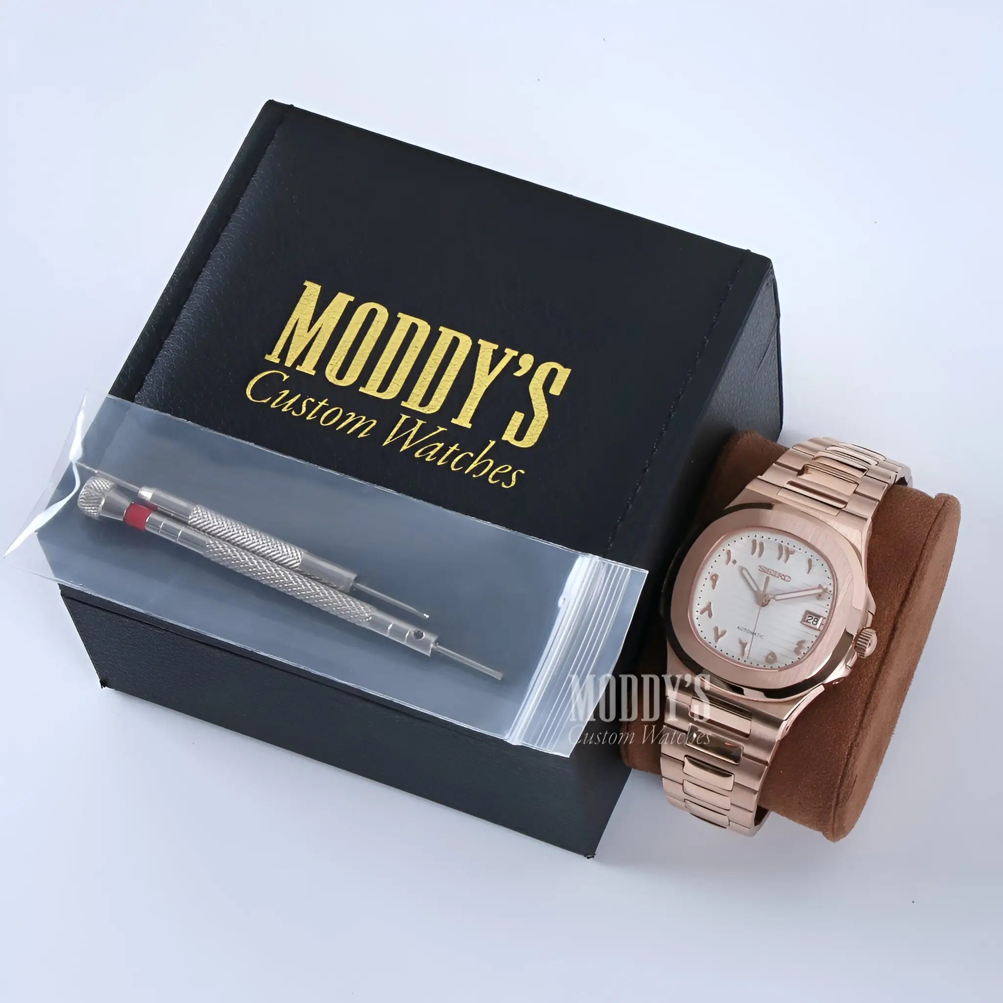 Nautiko Arabic Rose Gold watch with silver dial in custom box
