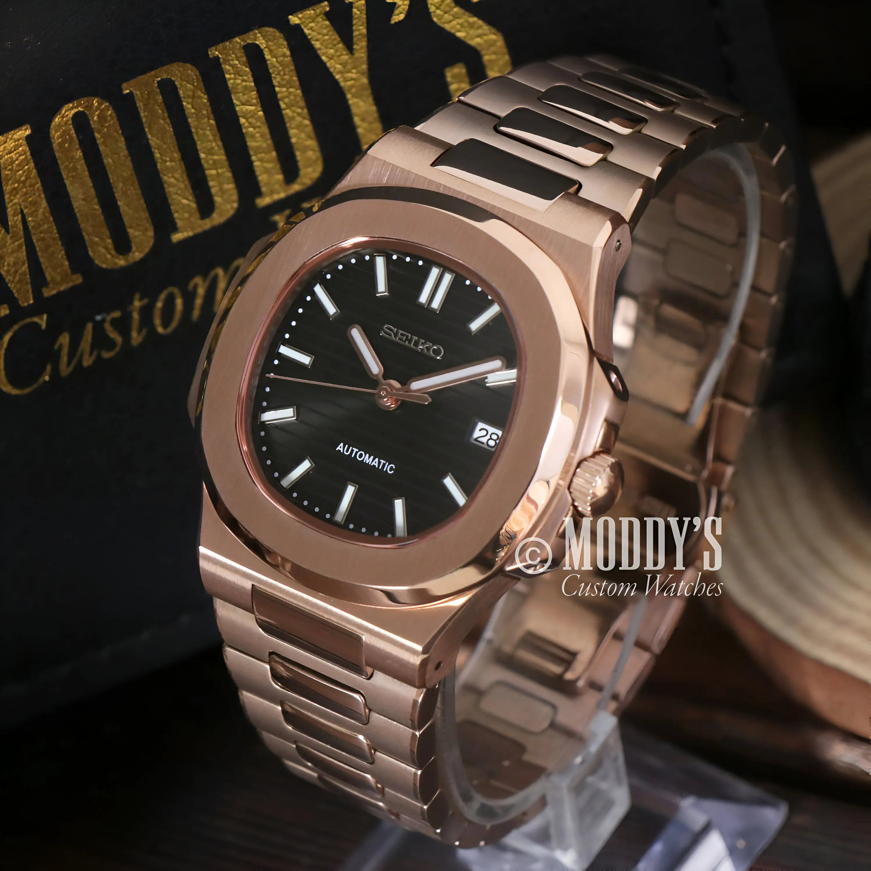 Rose gold black Seiko mod Nautilus watch with NH35 automatic movement