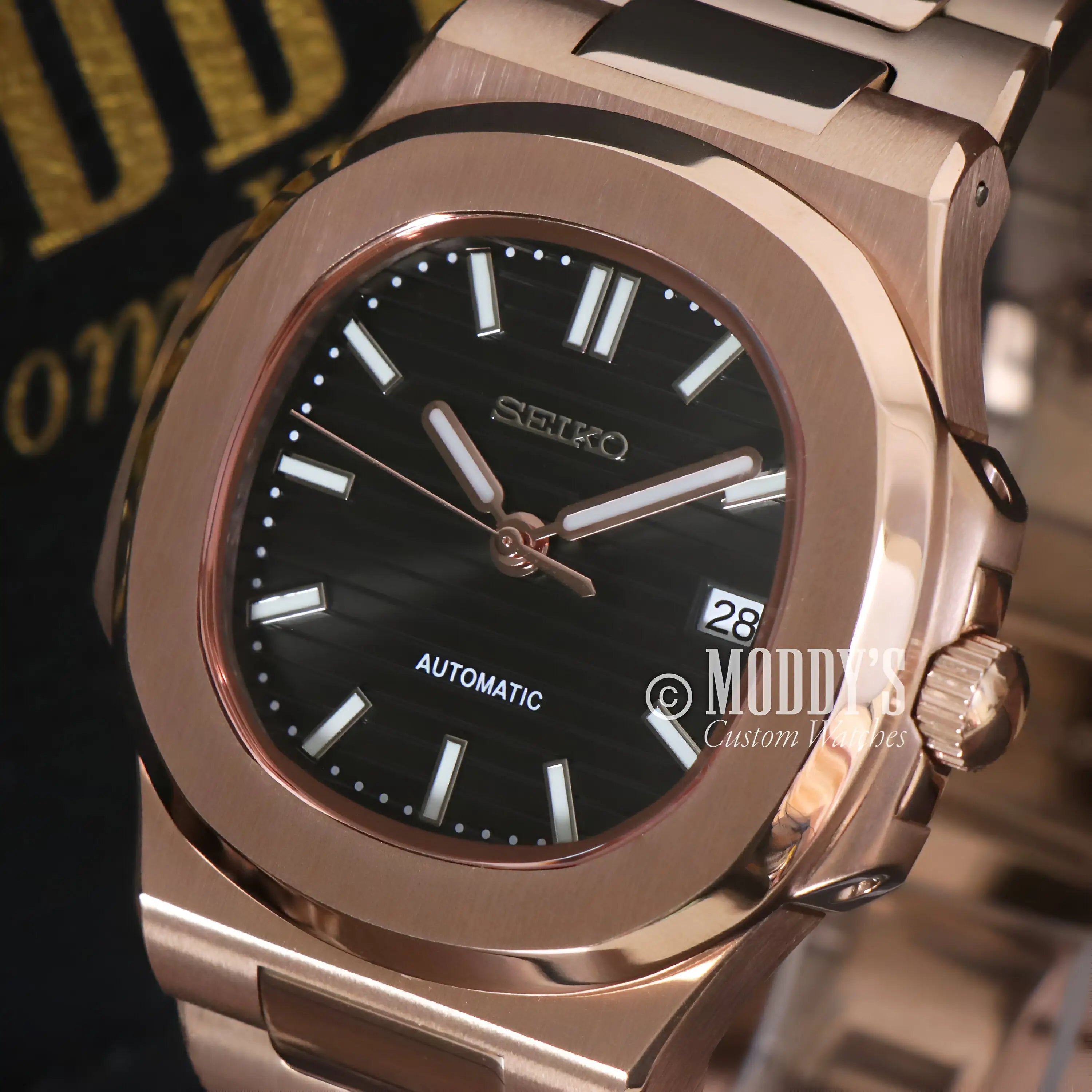 Rose gold black Seiko mod Nautilus watch with NH35 automatic movement