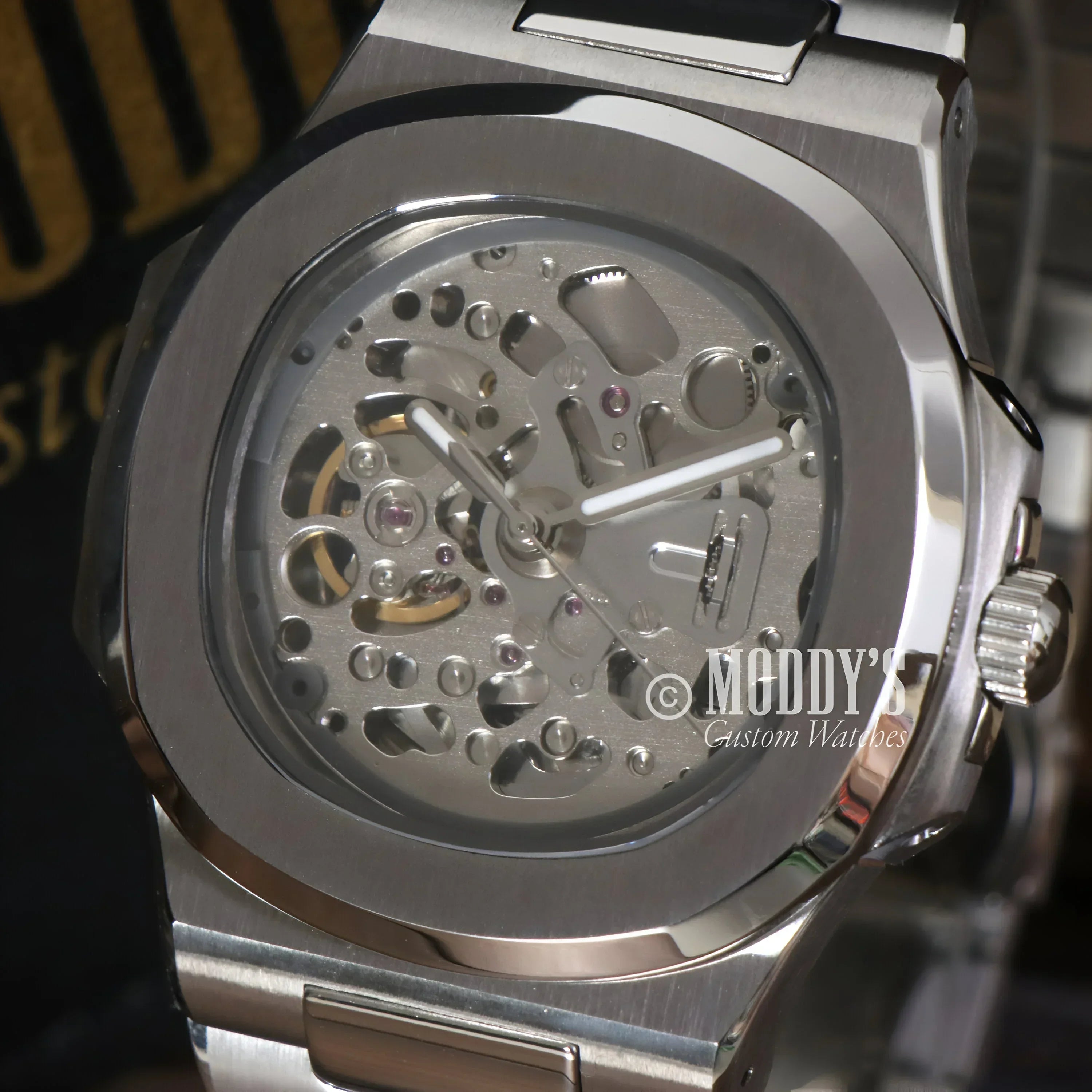 Silver skeletonized wristwatch Nautiko featuring Seiko NH70 automatic movement