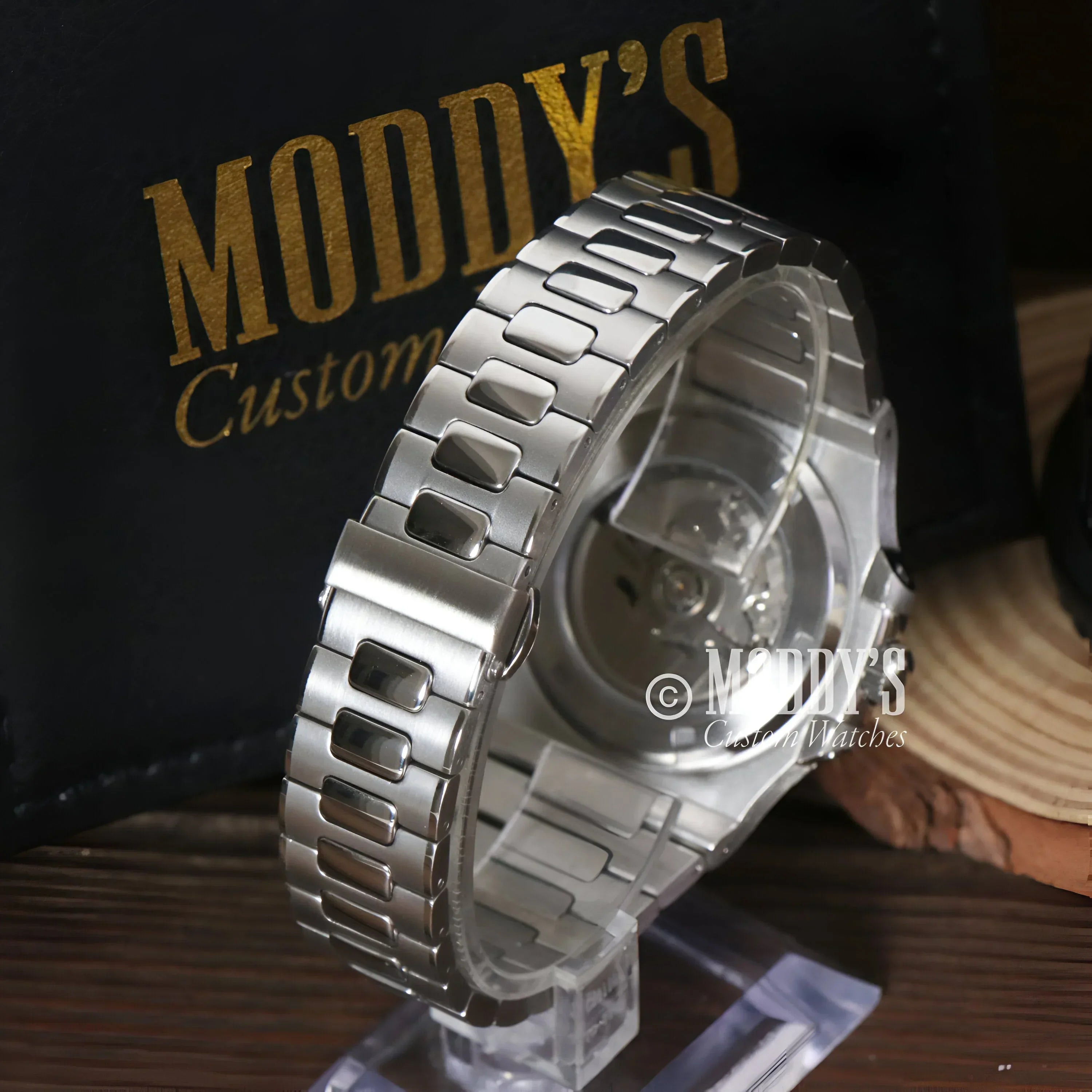 Silver Nautiko Skeleton wristwatch with metal band and NH70 automatic movement