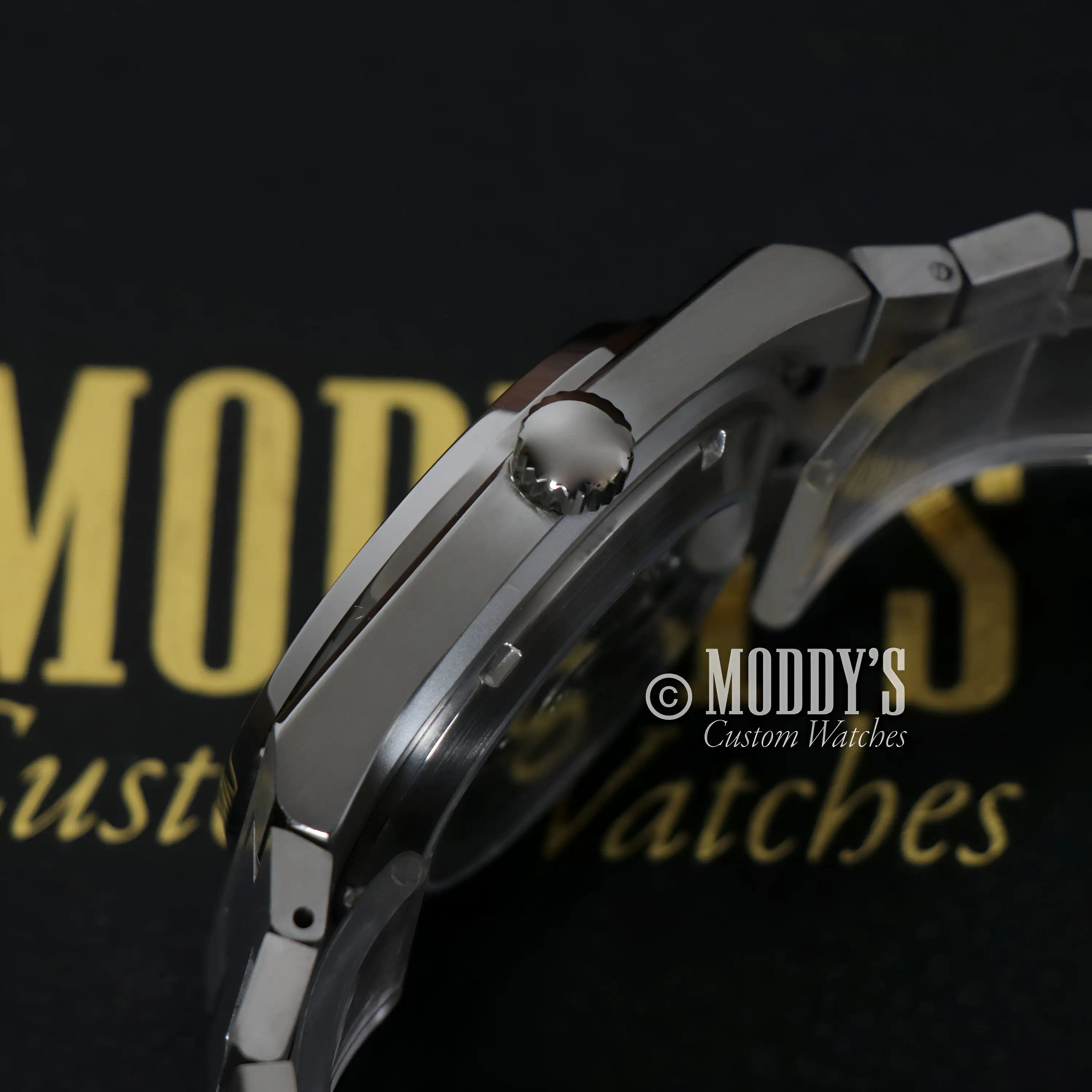 PRXeiko Ice Blue Seiko mod watch with black dial, silver accents, NH35 automatic