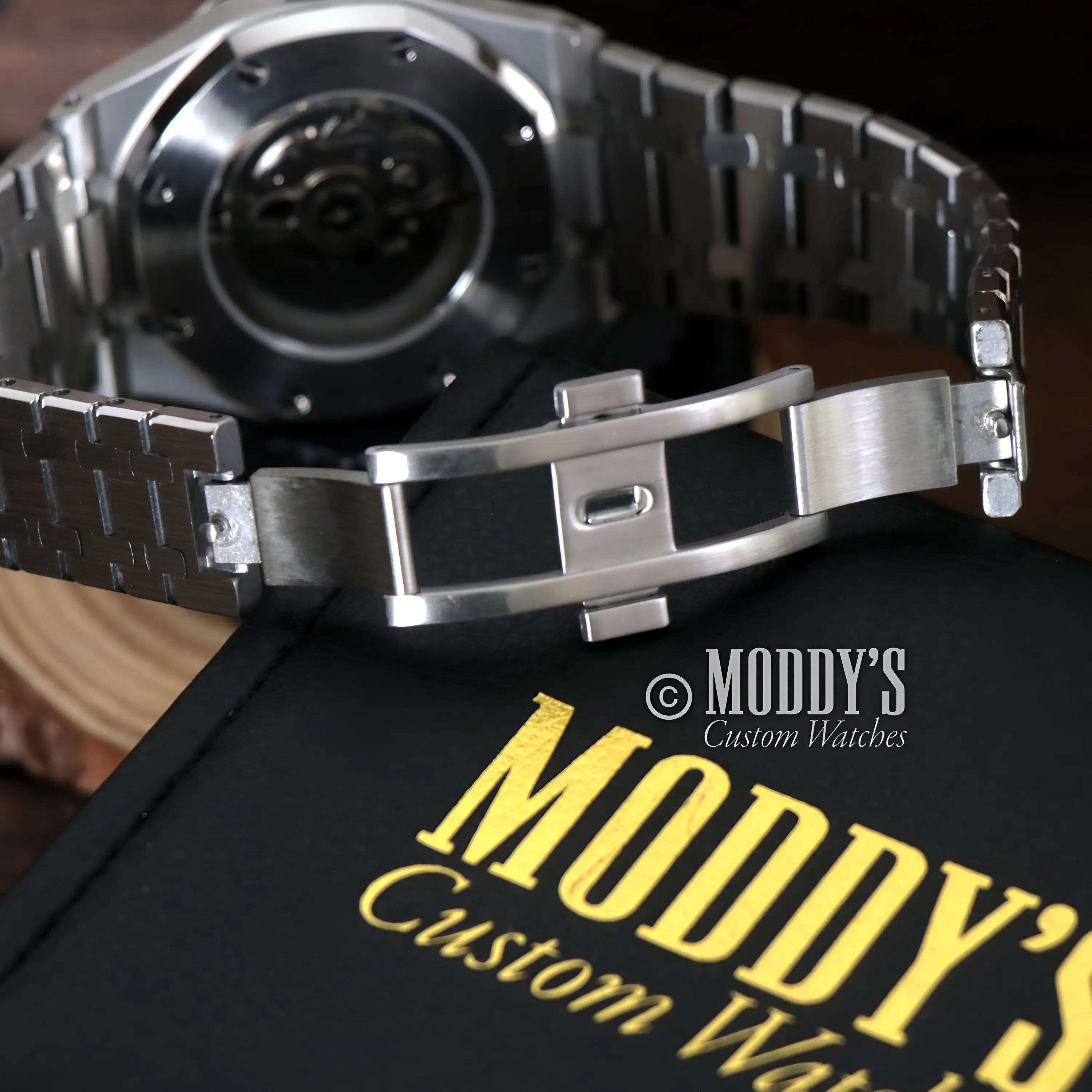 Sleek stainless steel and black ceramic Royal Oak mod watch with Seiko NH35 automatic