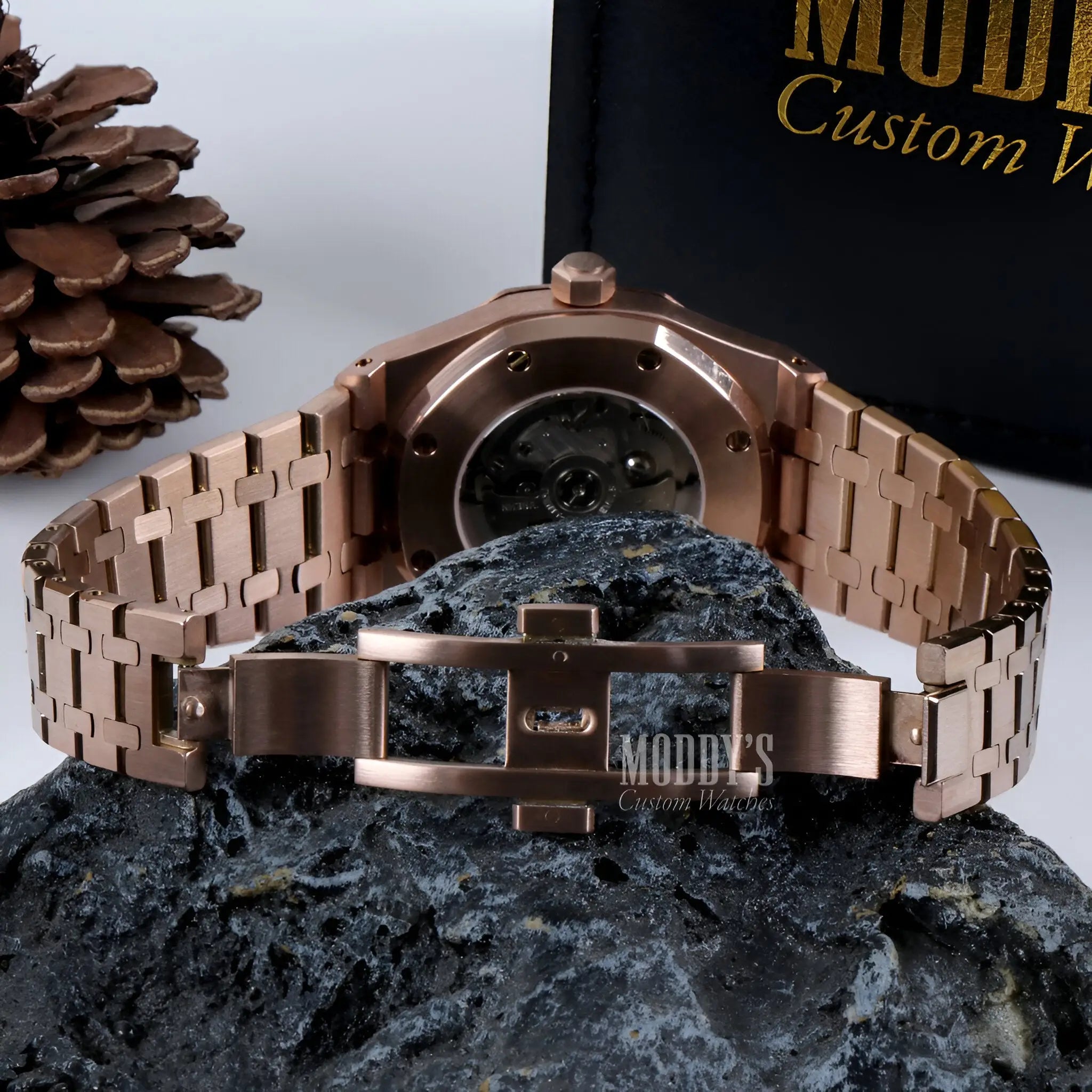 Rose gold skeleton Royal Seikoak watch with Seiko NH35 automatic, water resistant stainless steel band, black face, Royal Oak mod design