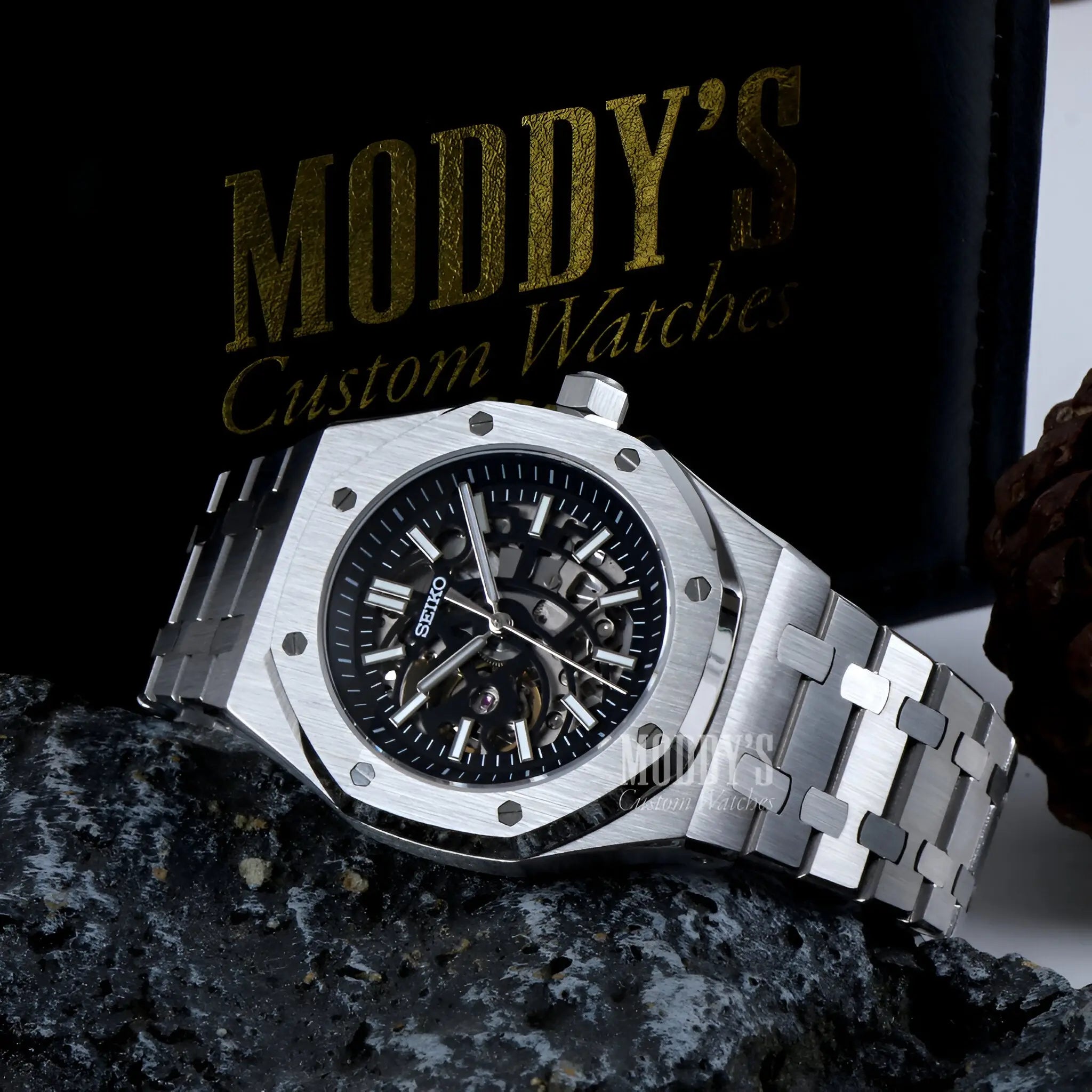 Stainless steel Seiko mod Royal Oak watch with black dial, skeletonized Seiko NH70 automatic movement and royal oak water resistance