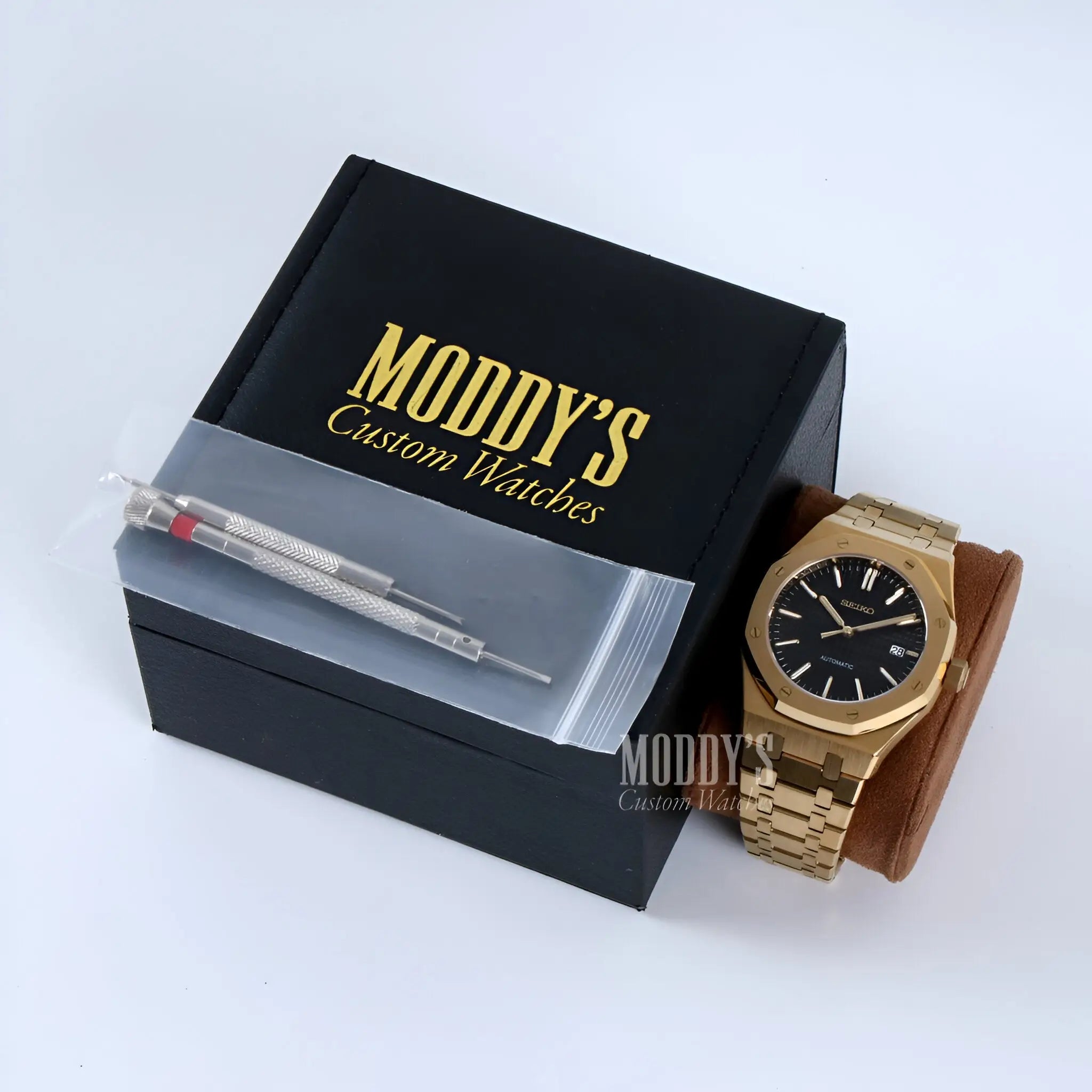 Iconic Royal Oak mod Patek Philippe Nautilus in yellow gold with black dial