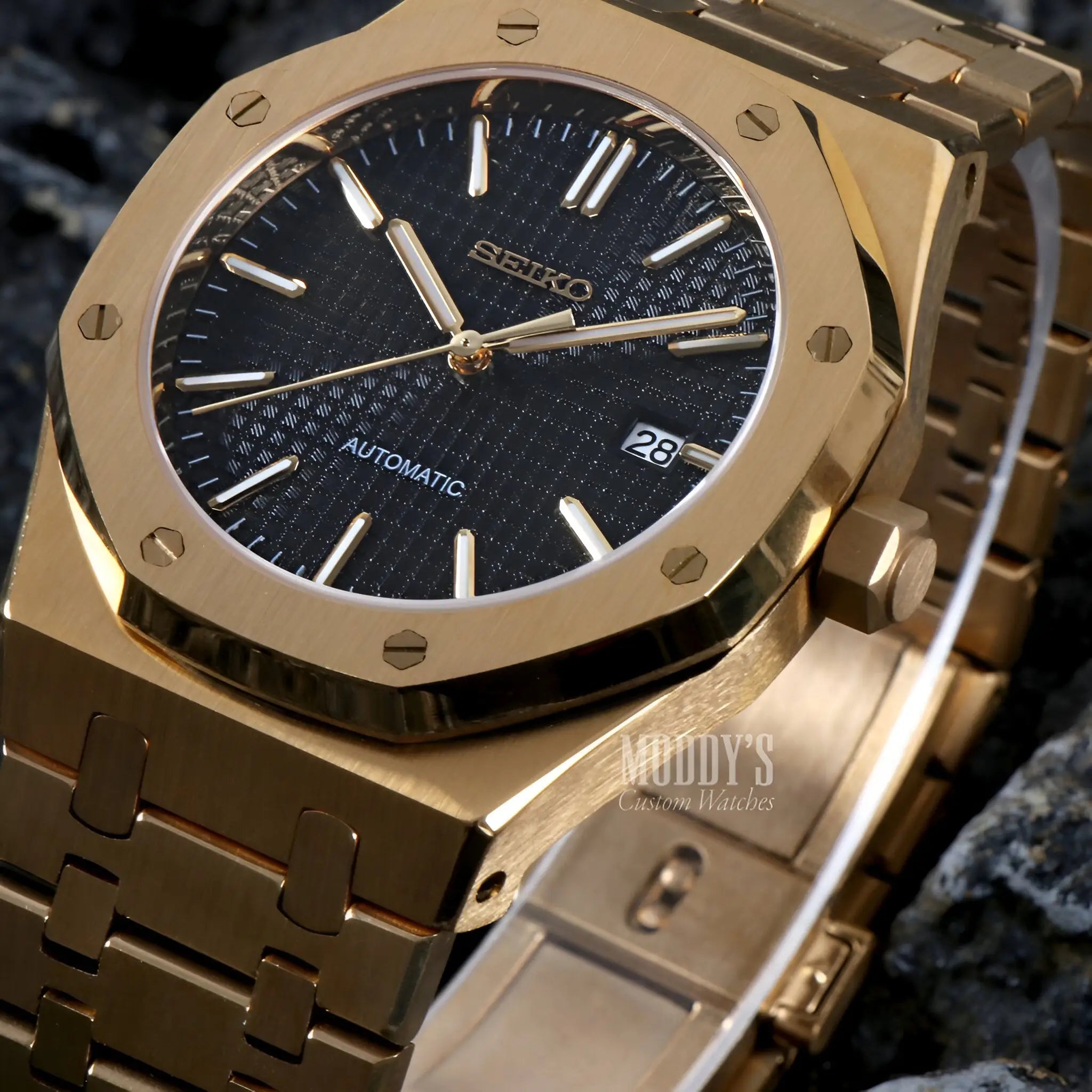 Gold and black Seiko NH35 automatic watch with textured dial, Royal Oak mod