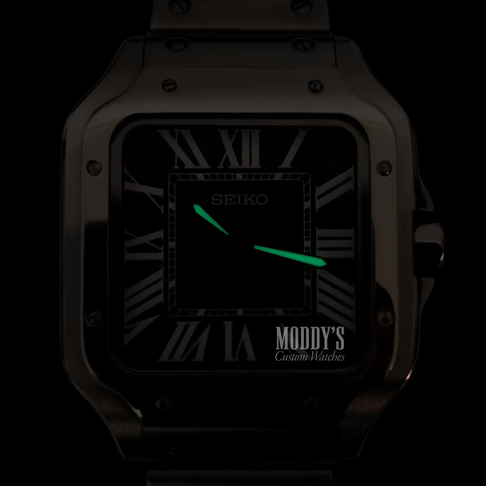 Seiko mod santos NH35 automatic watch with black face, green luminous hands