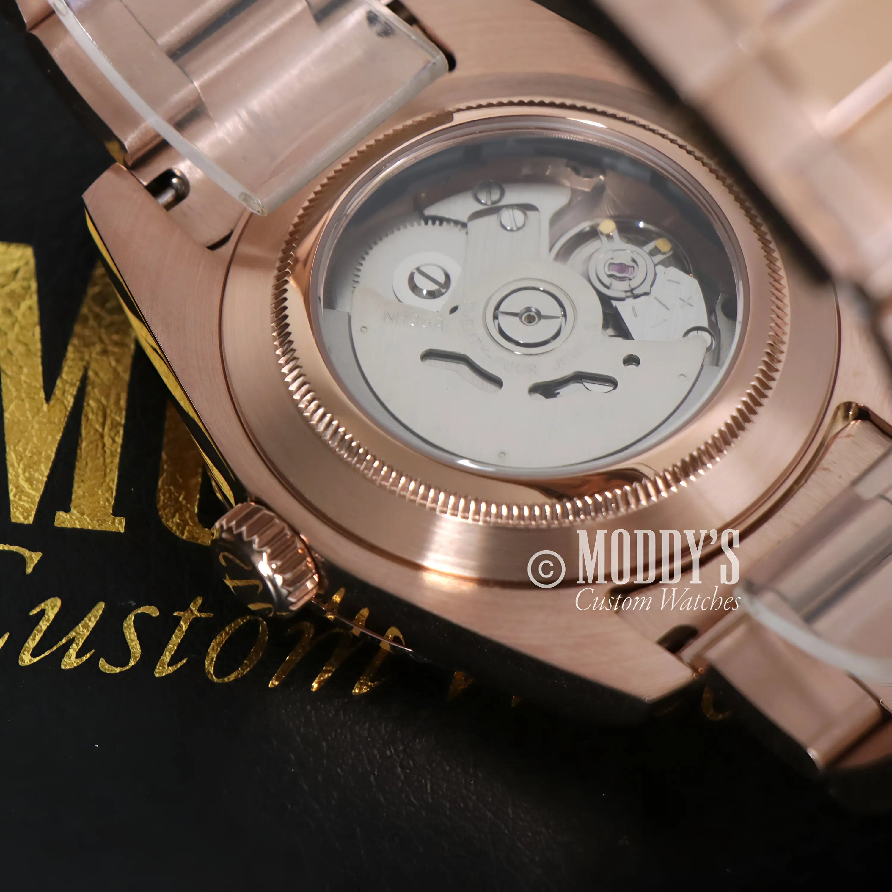 Seikojust Sky Dweller rose gold mechanical watch with transparent face
