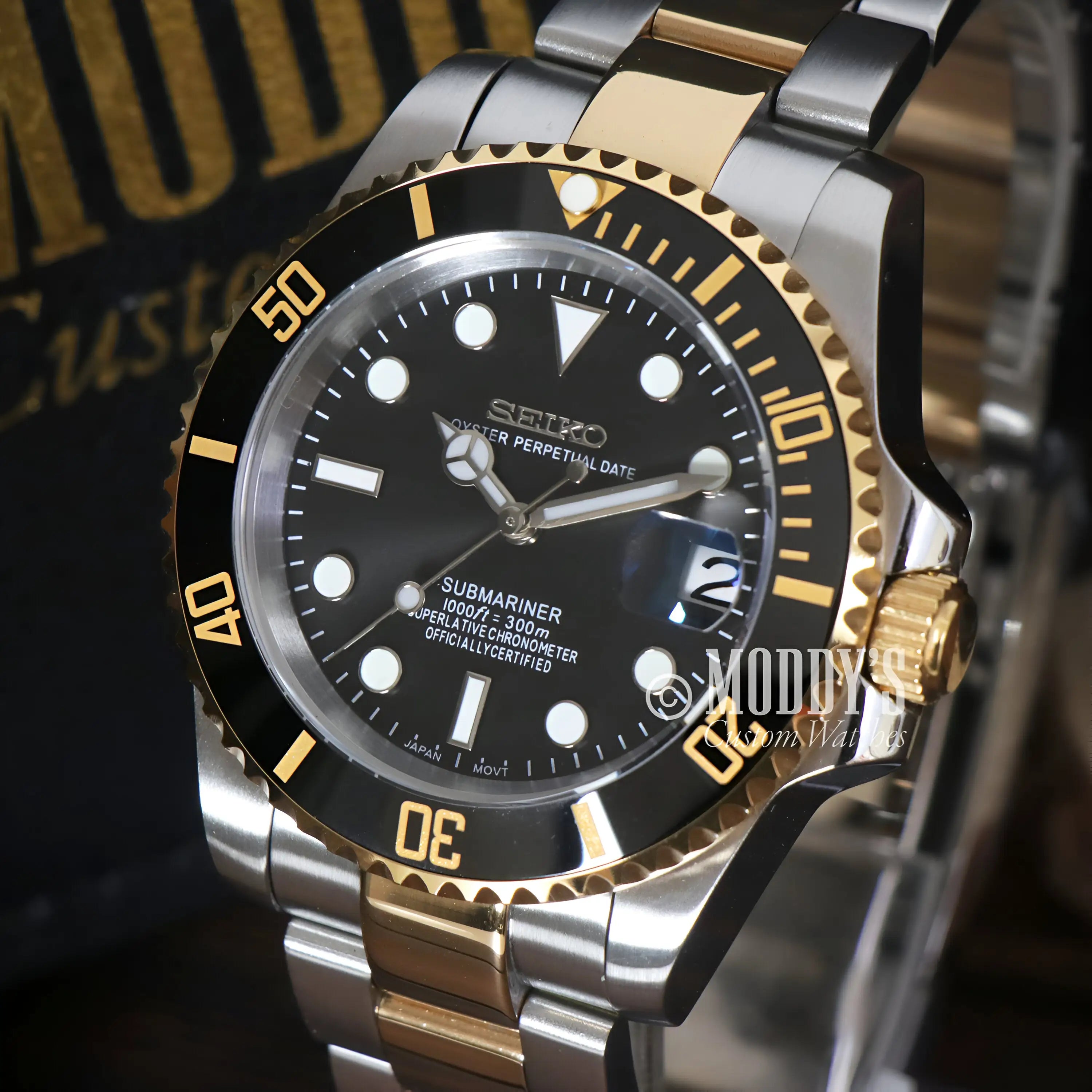 Seiko mod submariner two-tone gold silver watch with black dial and NH35 automatic movement