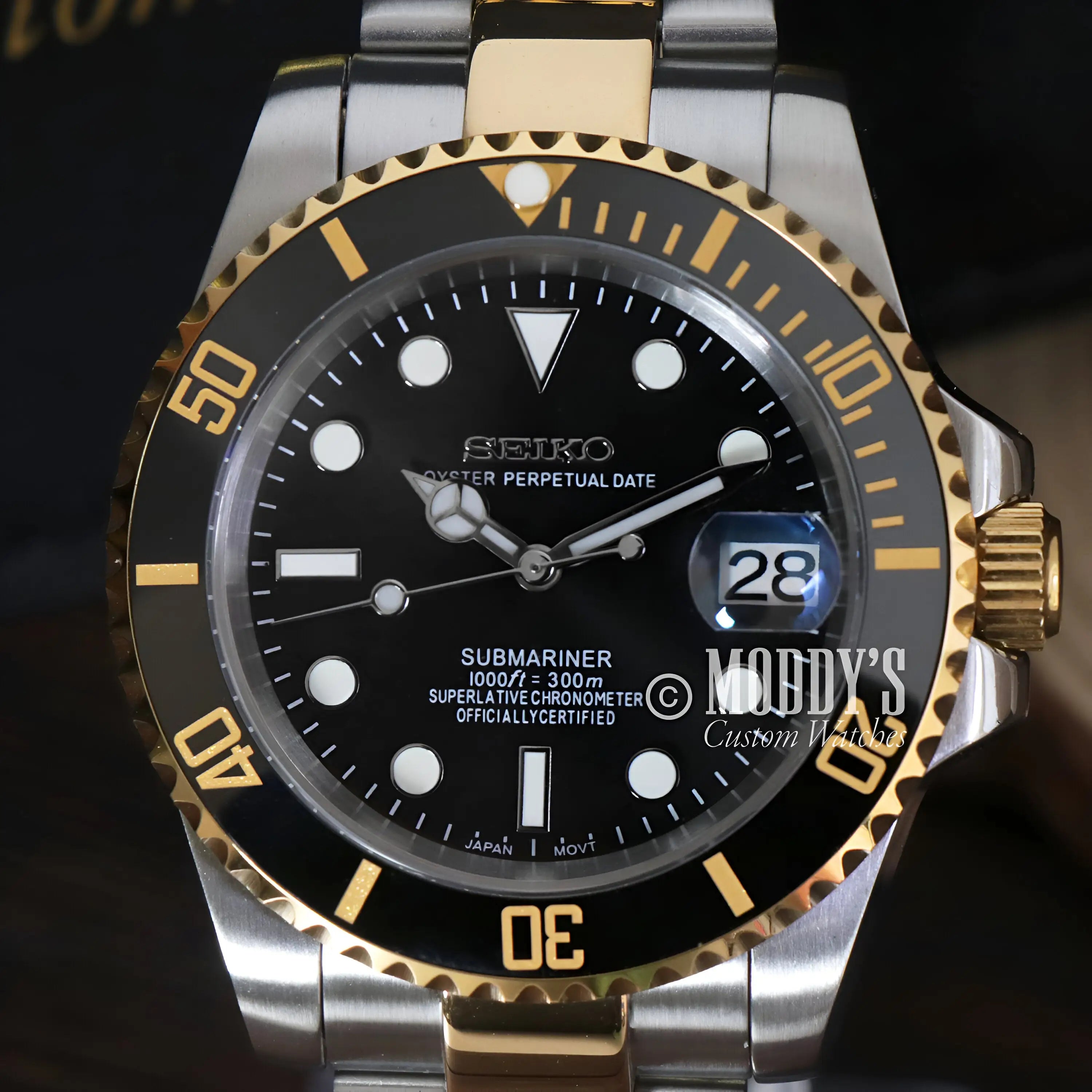 Two-tone Seiko mod Submariner watch with black dial, NH35 automatic movement, water resistance