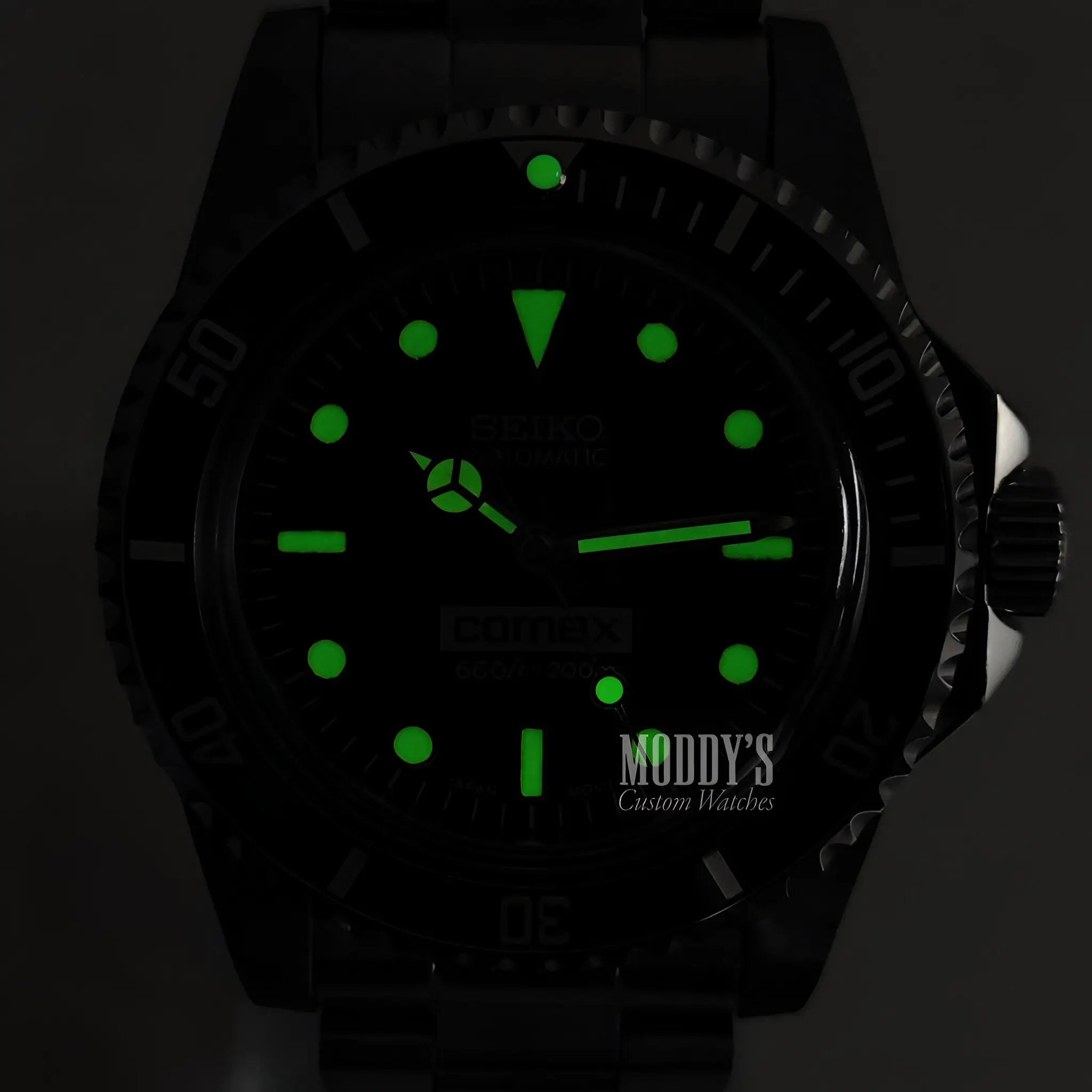 Vintage Seiko mod Submariner watch with black lume and green glow hands