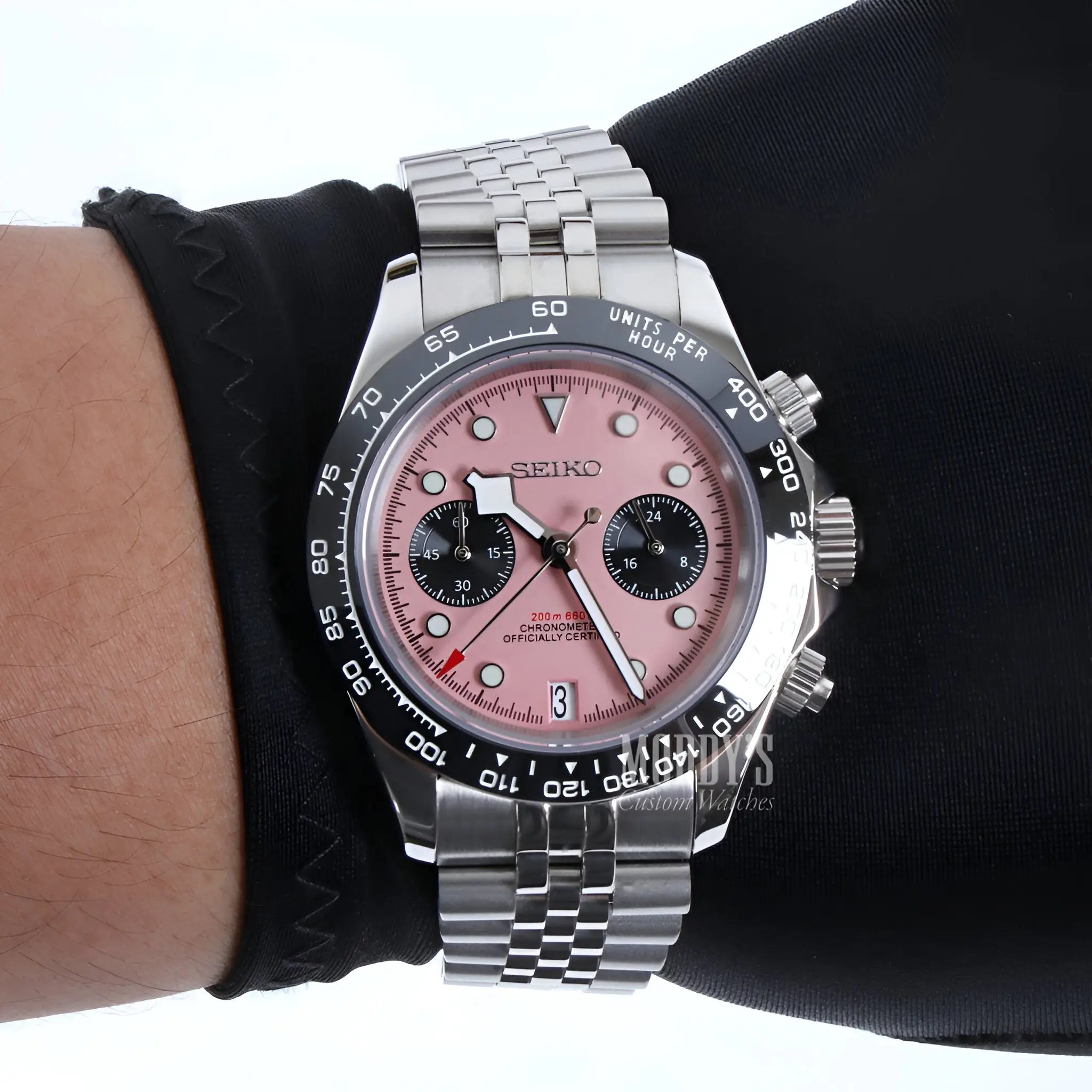 Pink Seiko VK63 hybrid chronograph watch with silver accents