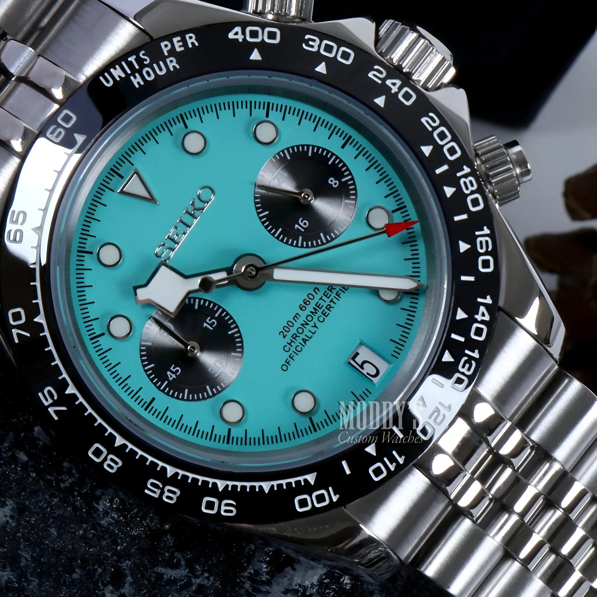 Seiko VK63 Hybrid Chrono Blue watch with turquoise dial