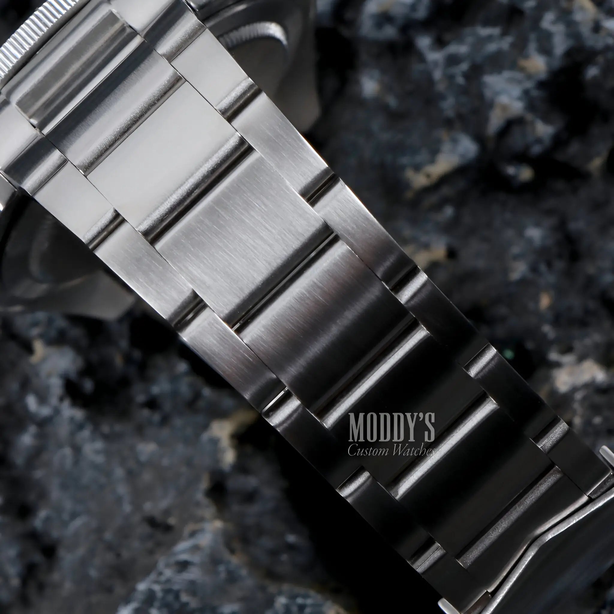 Pelagos Black Seiko mod watch with stainless steel brushed band and black links