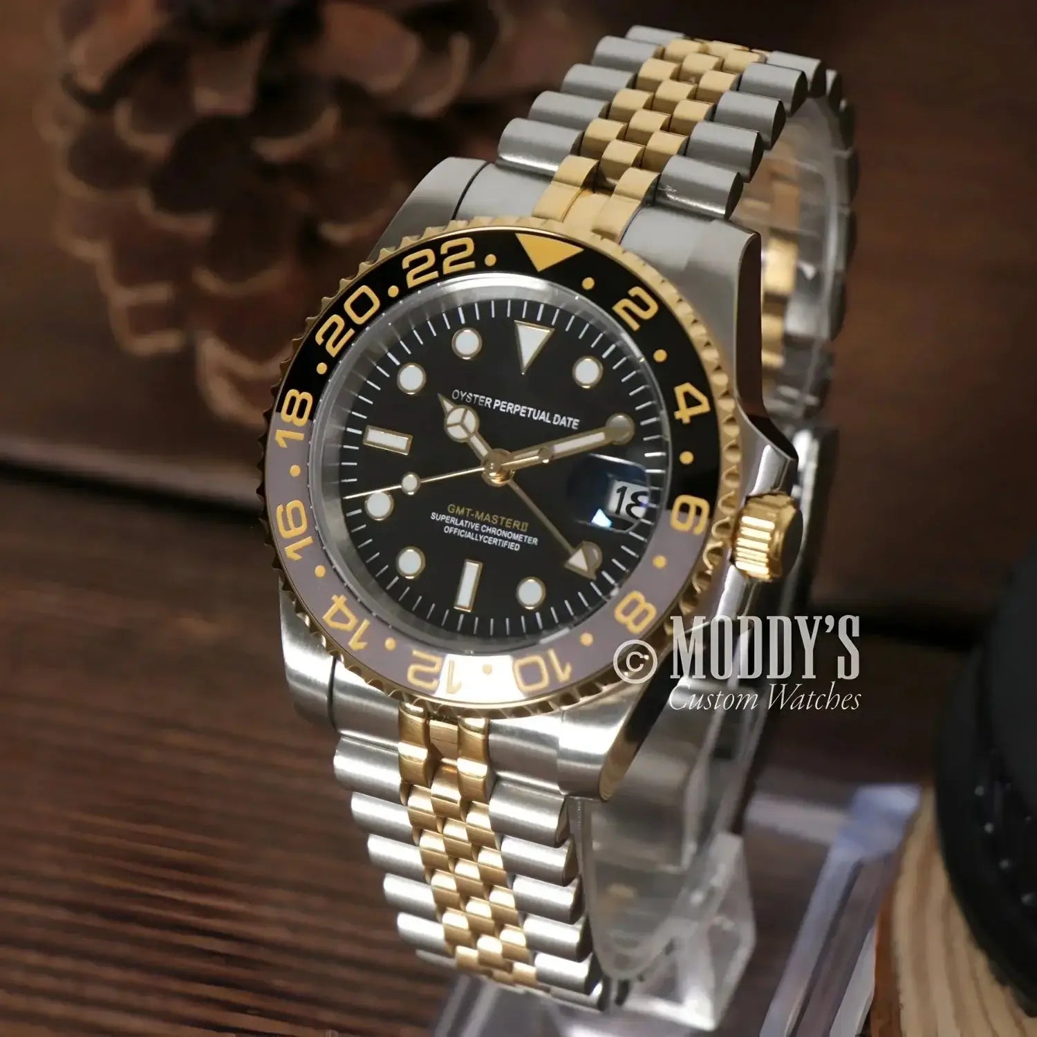 Two-tone gold and silver wristwatch GMTeiko featuring NH34 automatic movement