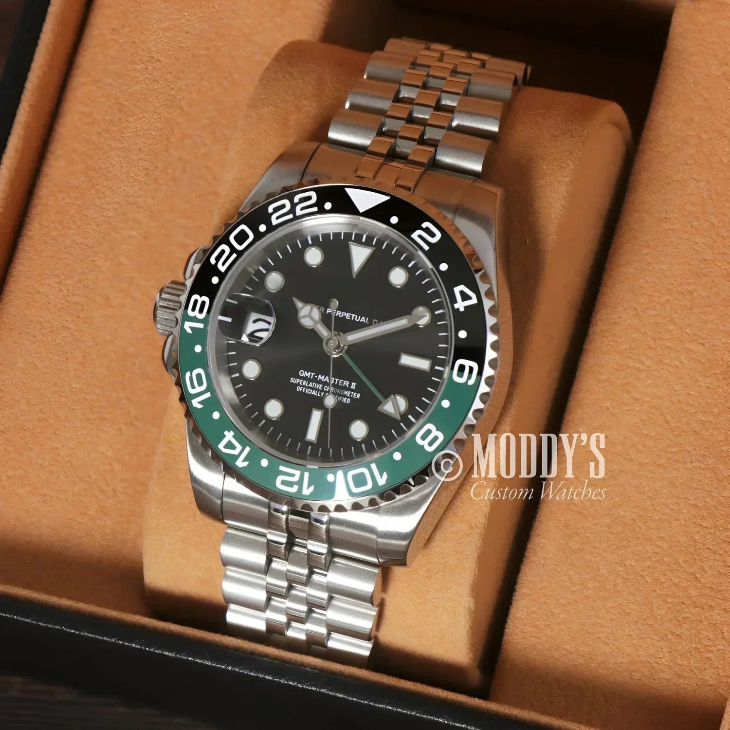 Silver wristwatch GMTeiko Sprite with black and green bezel, Seiko NH34 Automatic Movement