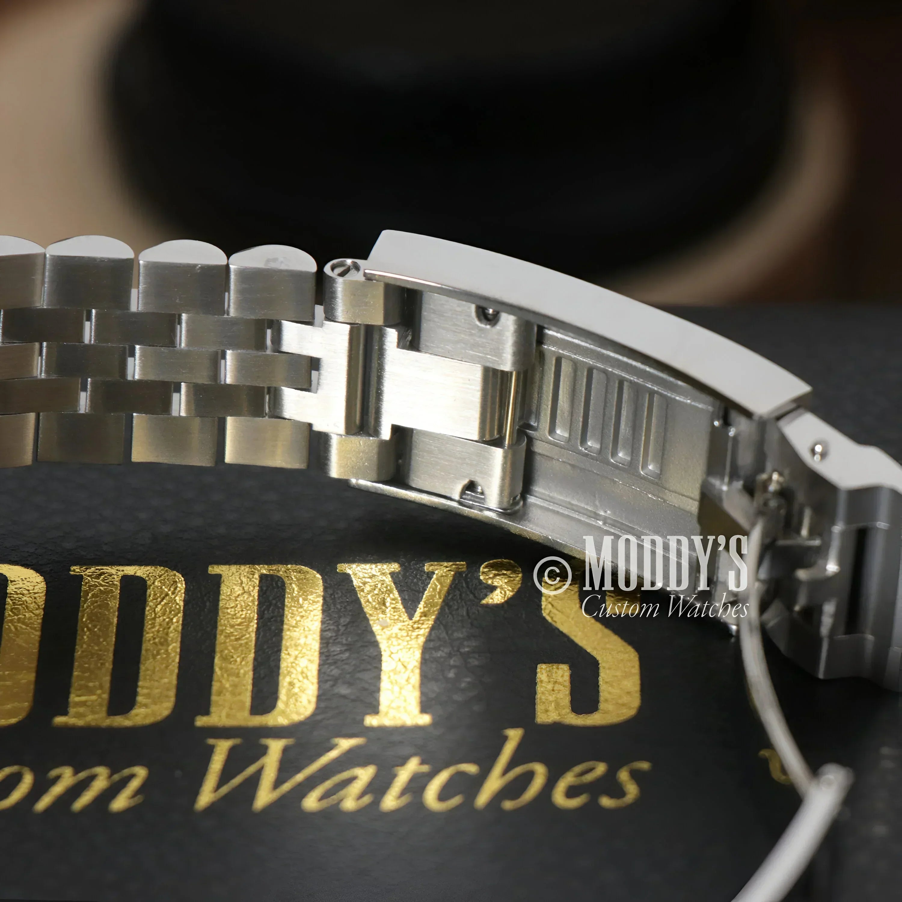 Silver watch band with clasp for GMTeiko Sprite featuring Seiko NH34 automatic movement