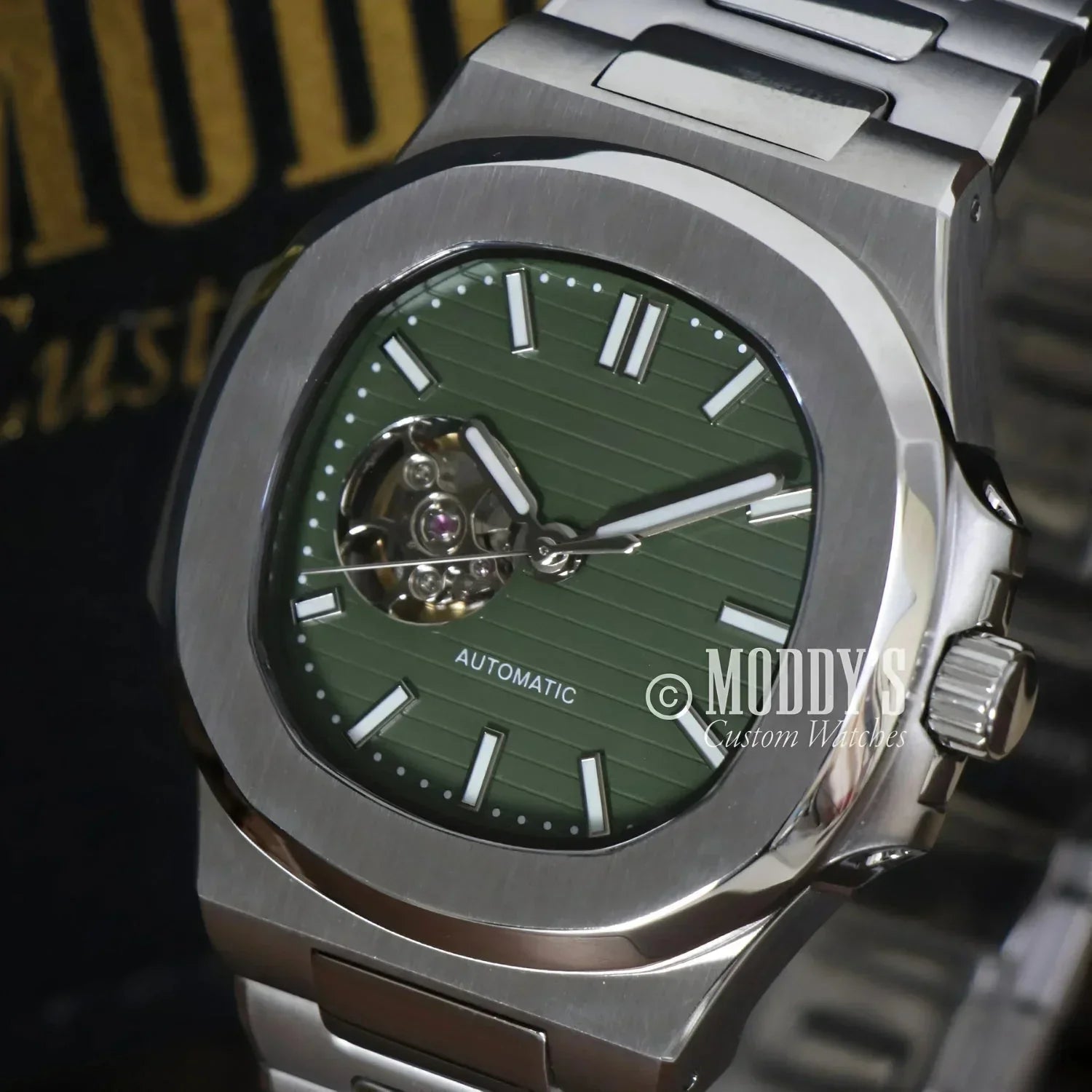 Green-faced Nautiko watch featuring NH38 automatic movement and open movement design