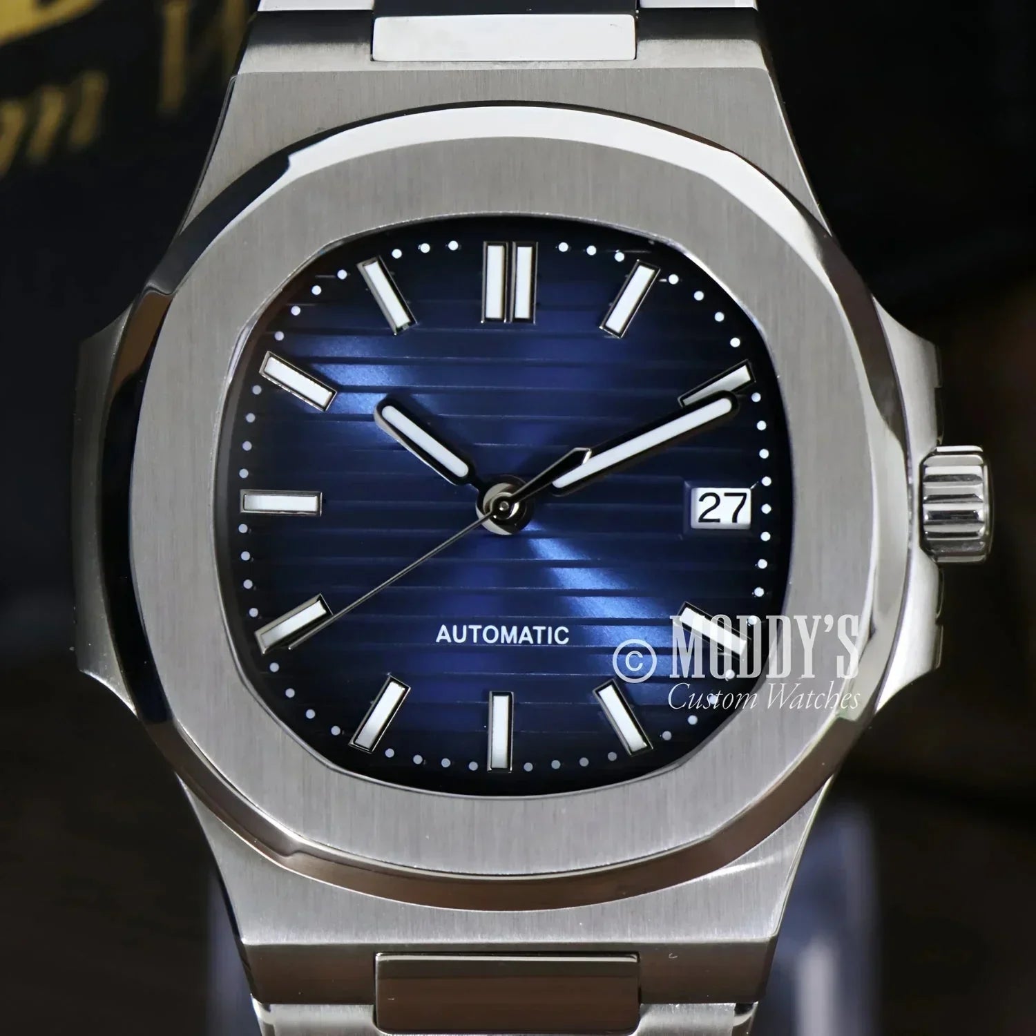 Silver wristwatch with blue face, Nautiko Royal Blue featuring NH35 automatic movement