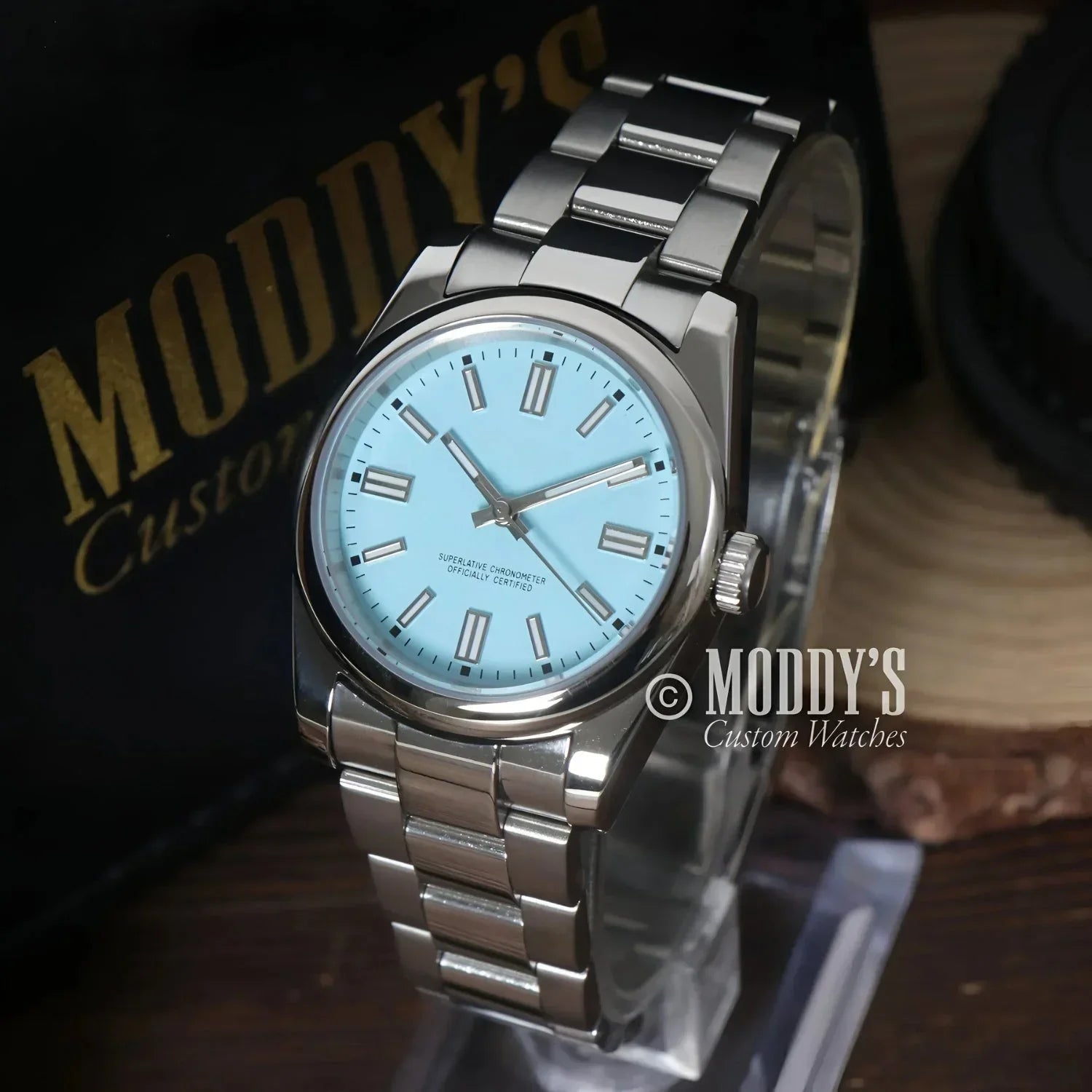 Silver wristwatch with Tiffany Blue face featuring NH35 automatic movement, Seiko mod style