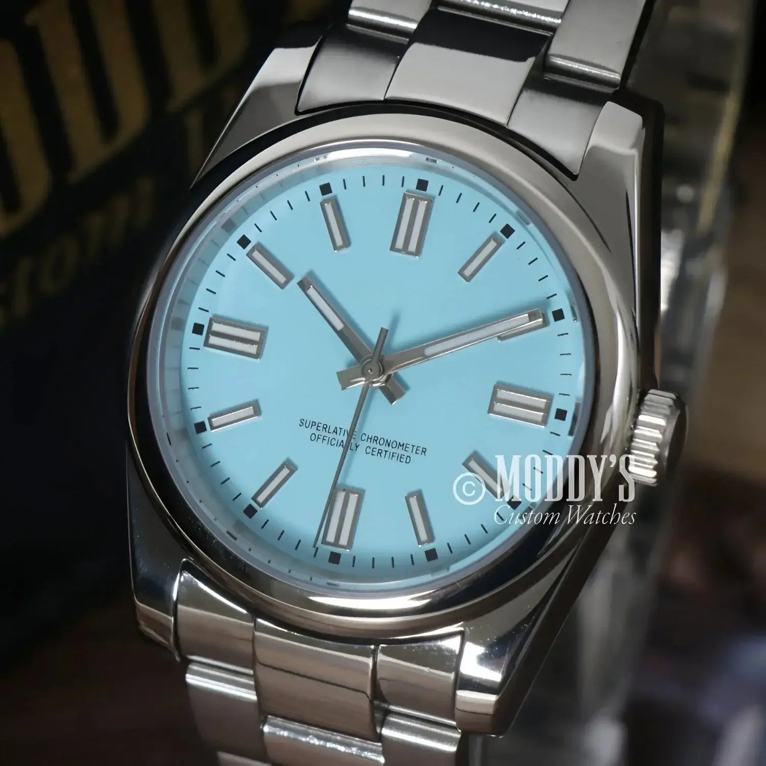 Silver Seiko mod wristwatch with a Tiffany Blue face and NH35 automatic movement