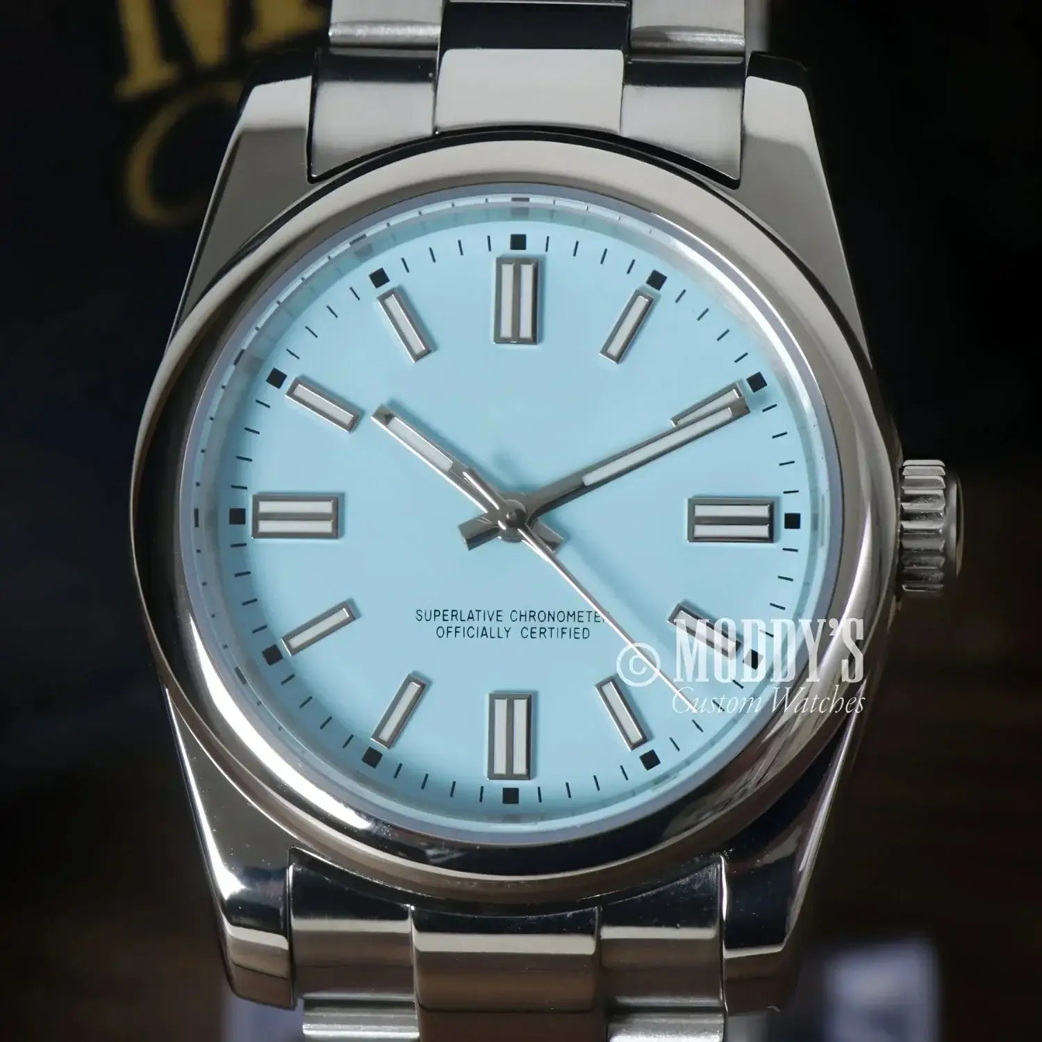 Silver Seiko Mod wristwatch with a Tiffany Blue face and NH35 automatic movement