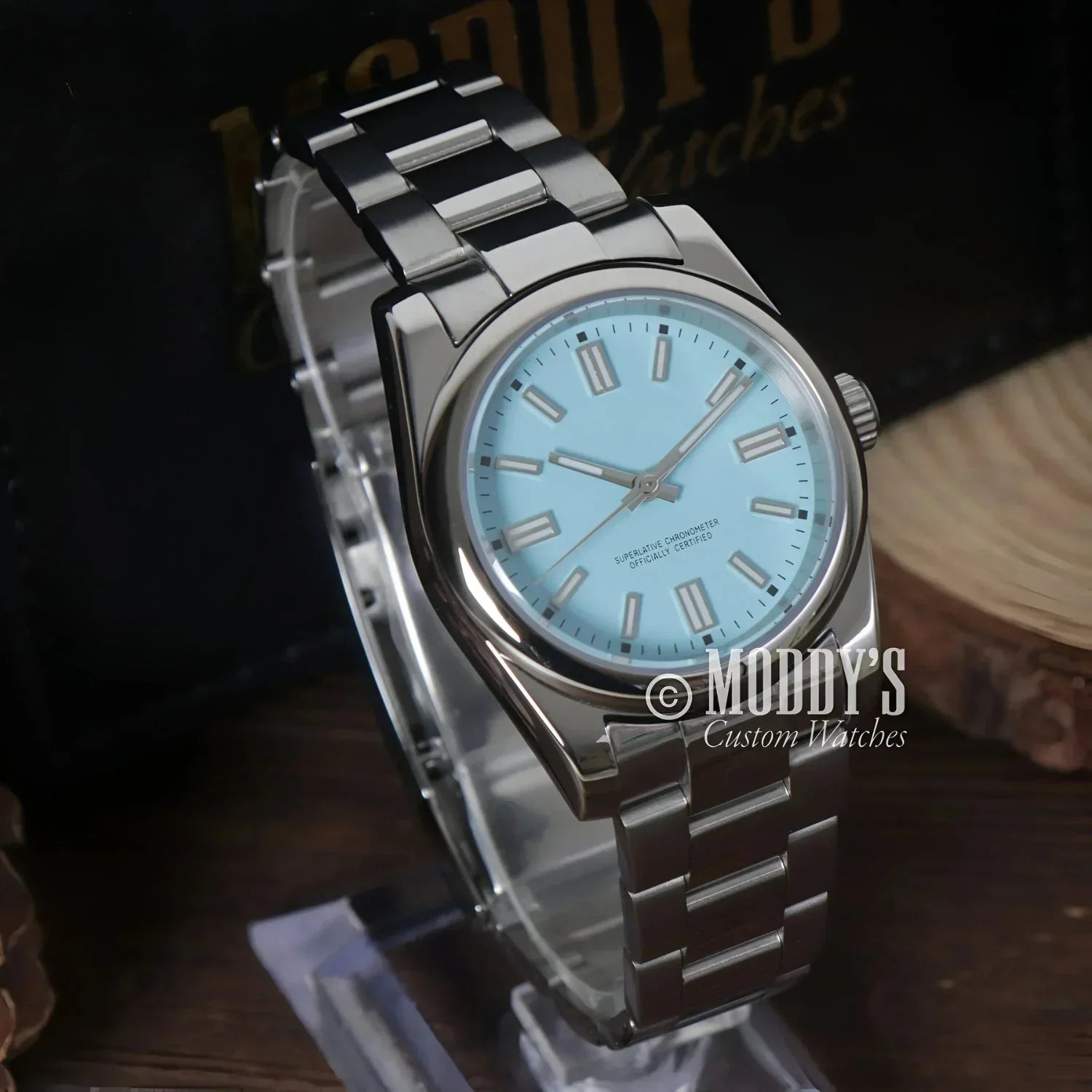 Silver Seiko Mod wristwatch featuring a Tiffany Blue face and NH35 automatic movement