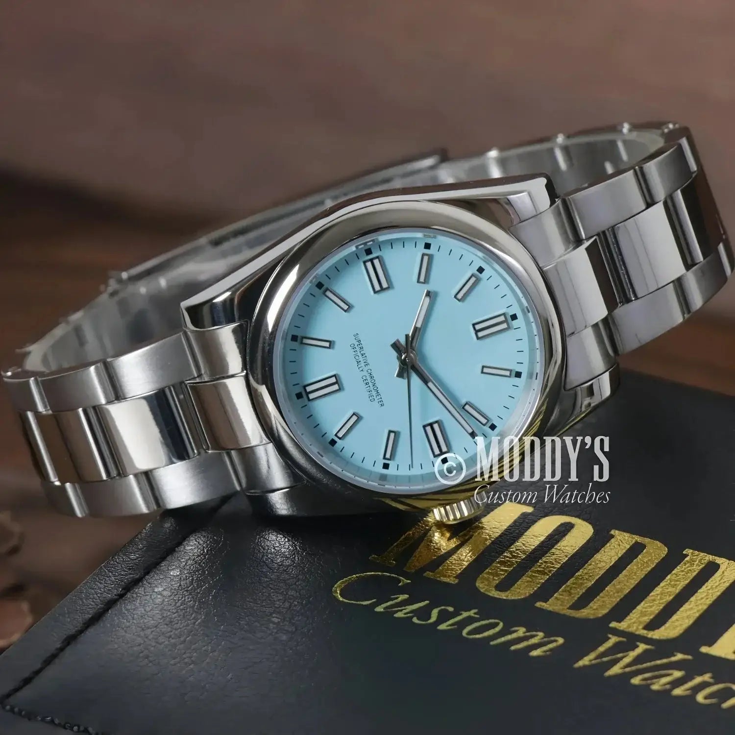 Silver wristwatch with light blue face from Oysteiko Tiffany Blue featuring Seiko Mod design