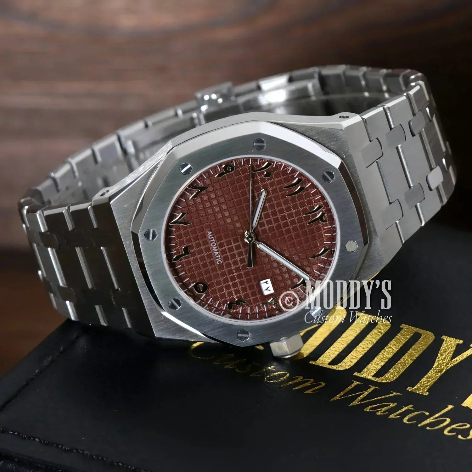 Silver wristwatch with brown patterned face, Royal Seikoak with NH35 automatic movement