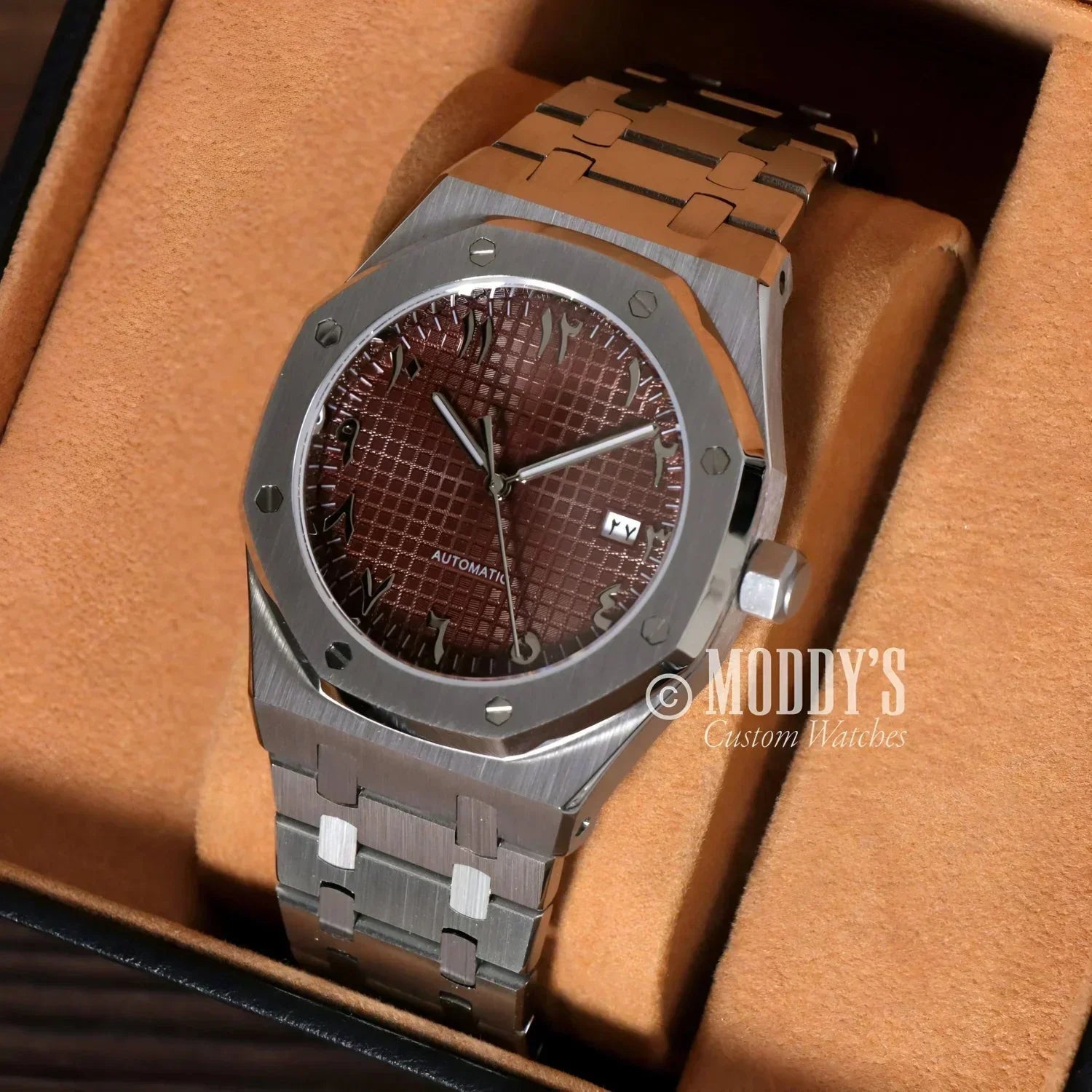 Silver wristwatch with brown patterned face, Royal Seikoak with NH35 automatic movement